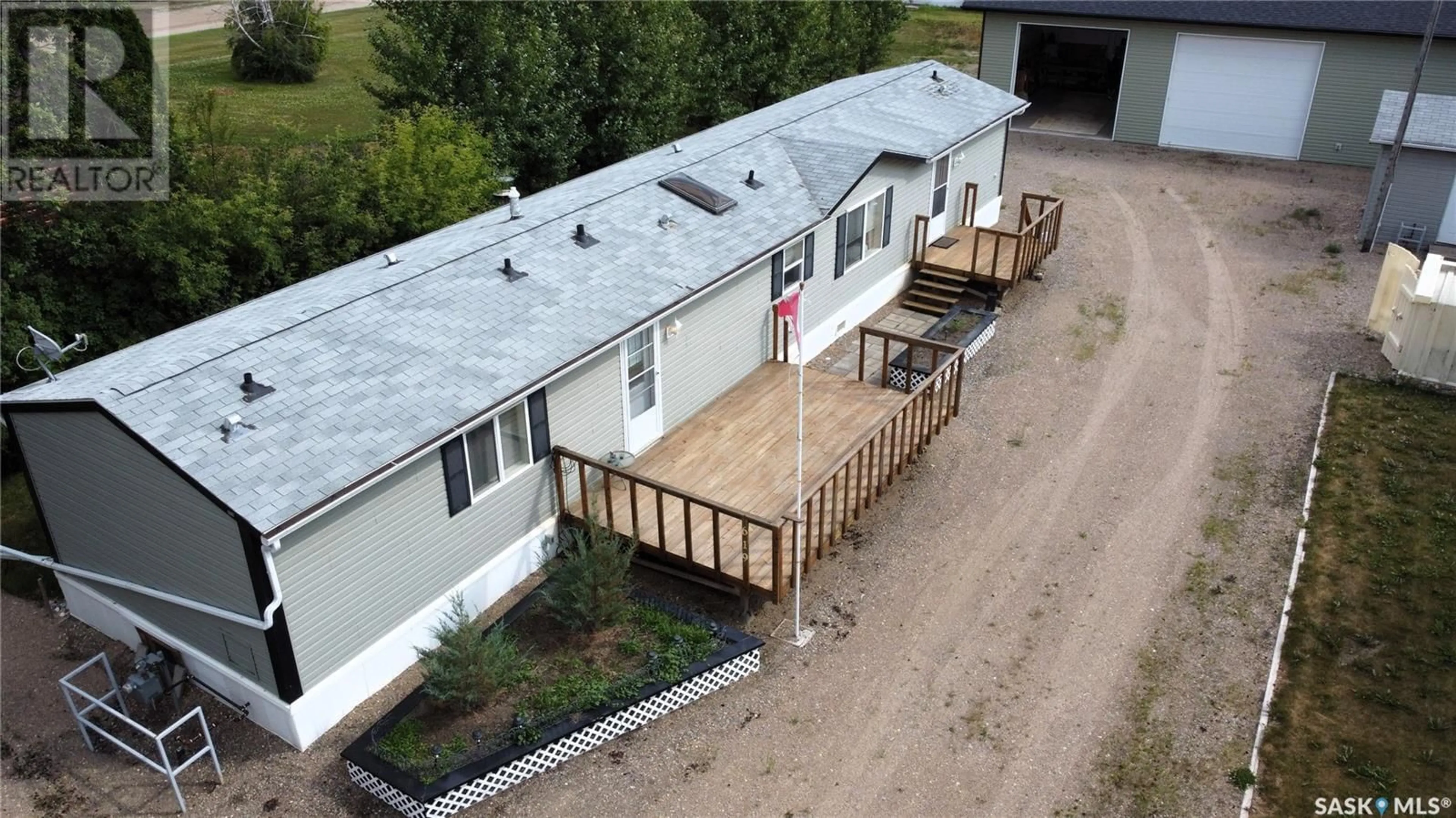 A pic from outside/outdoor area/front of a property/back of a property/a pic from drone, building for 619 1ST AVENUE, Choiceland Saskatchewan S0J0M0