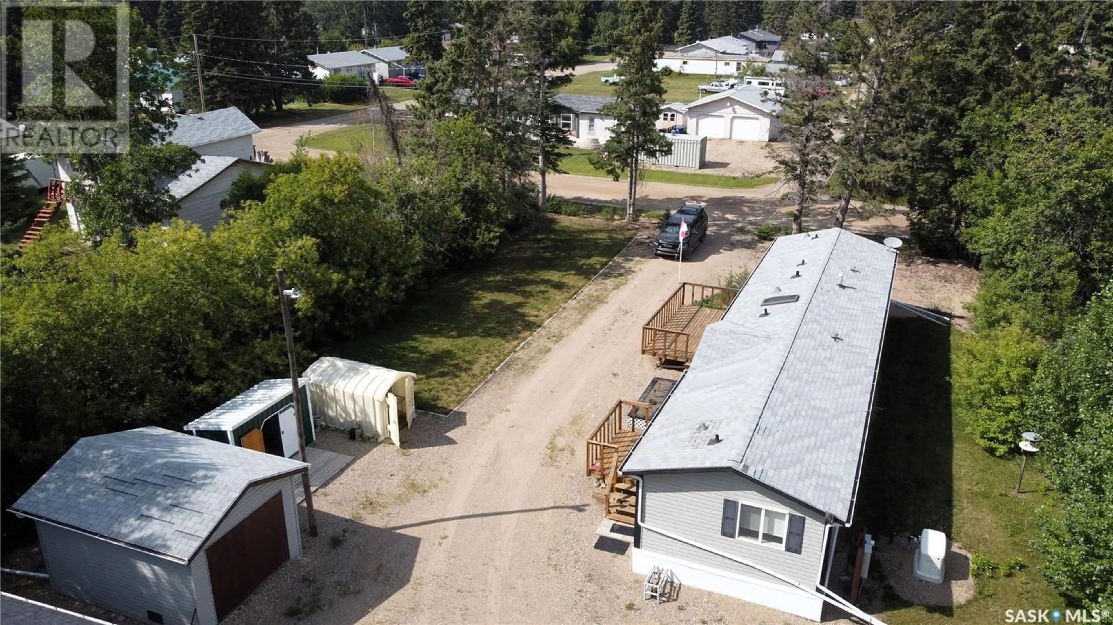 A pic from outside/outdoor area/front of a property/back of a property/a pic from drone, street for 619 1ST AVENUE, Choiceland Saskatchewan S0J0M0