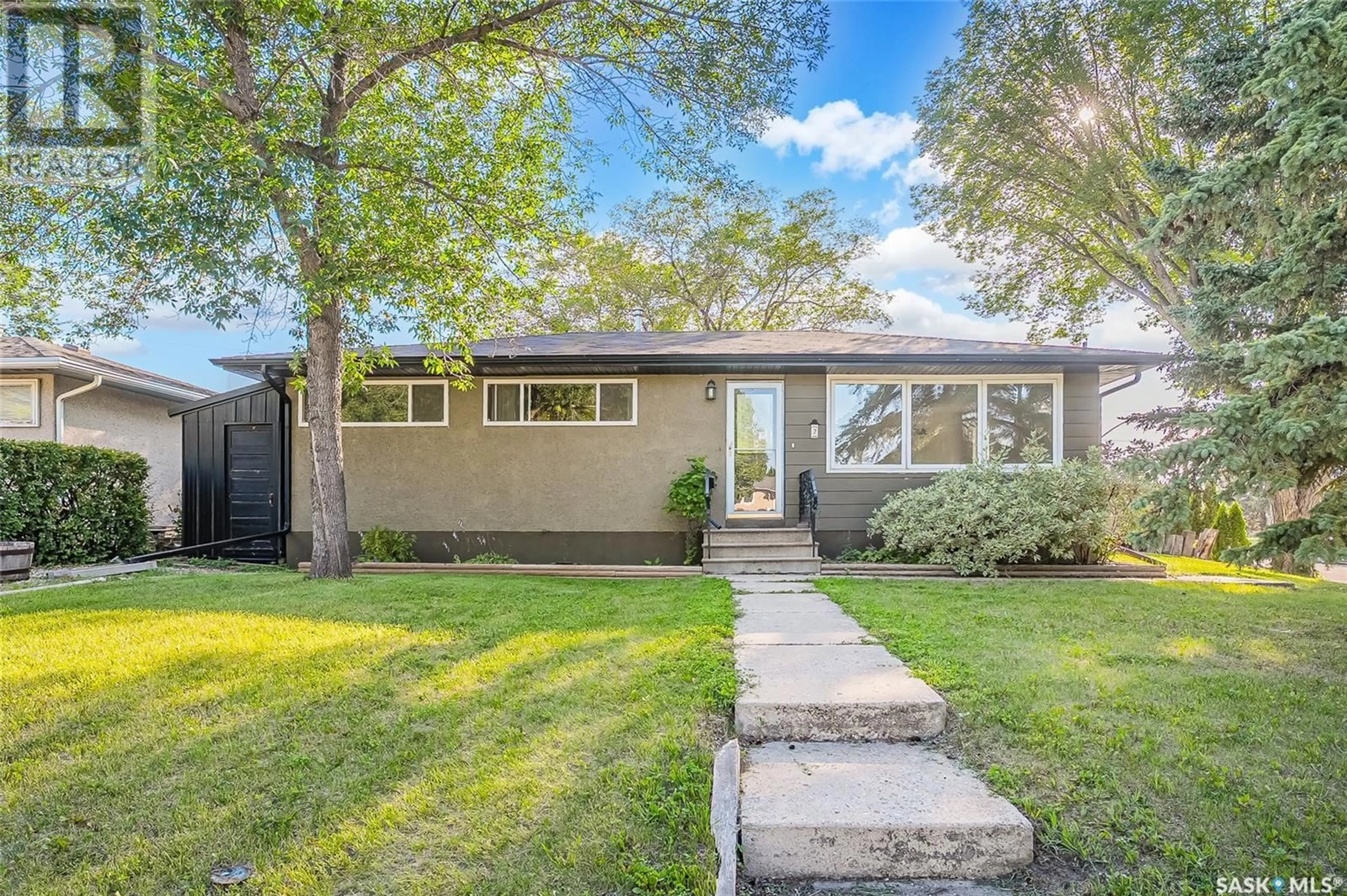 Home with vinyl exterior material, street for 2 YOUNG CRESCENT, Saskatoon Saskatchewan S7J2C4