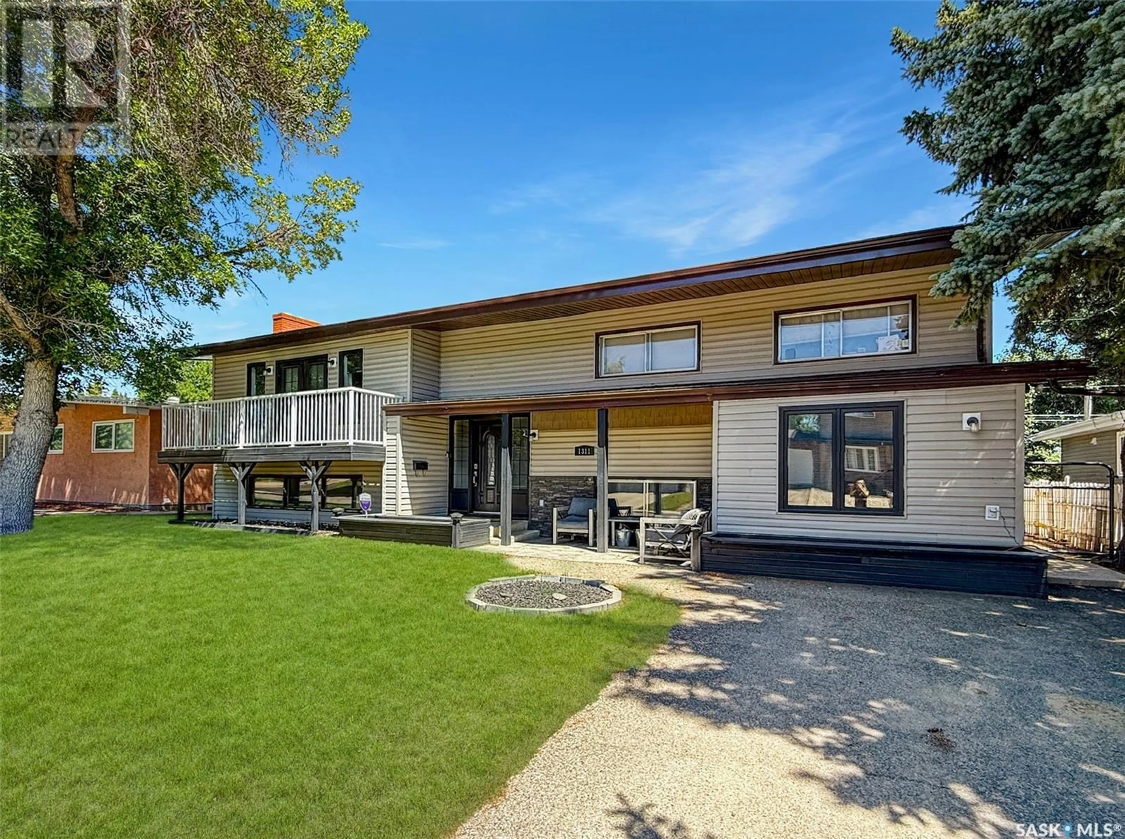 Home with brick exterior material, street for 1311 JUBILEE DRIVE, Swift Current Saskatchewan S9H2A5
