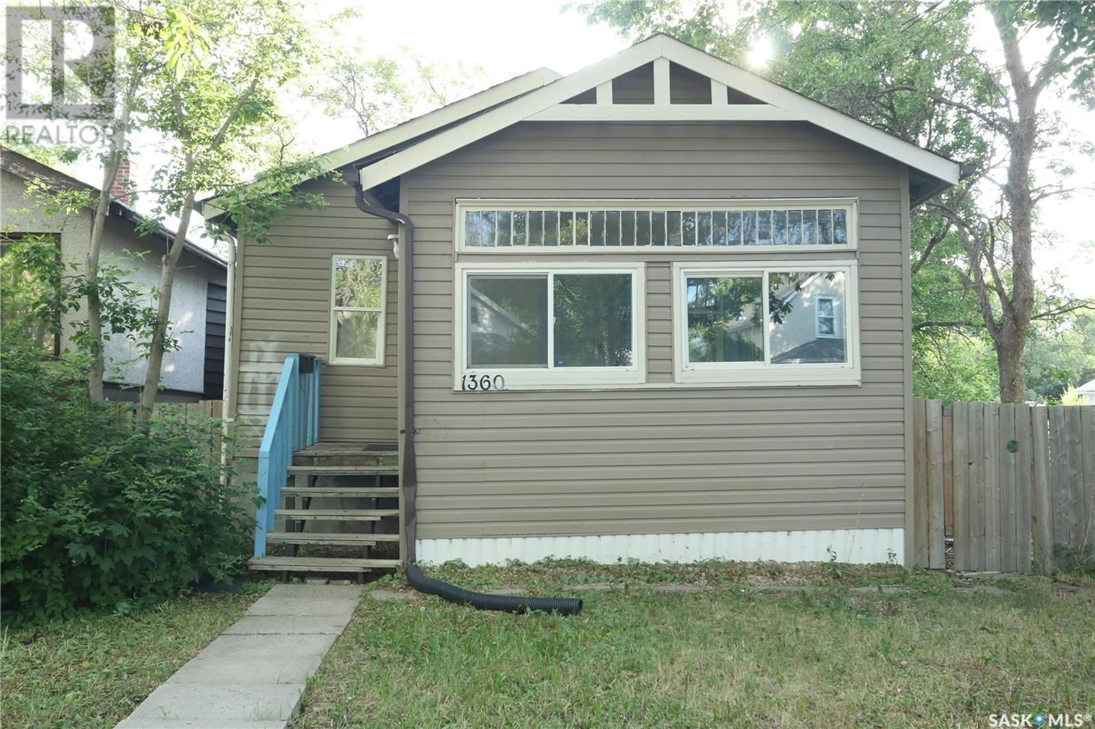 Home with vinyl exterior material, street for 1360 ATHOL STREET, Regina Saskatchewan S4T3C5