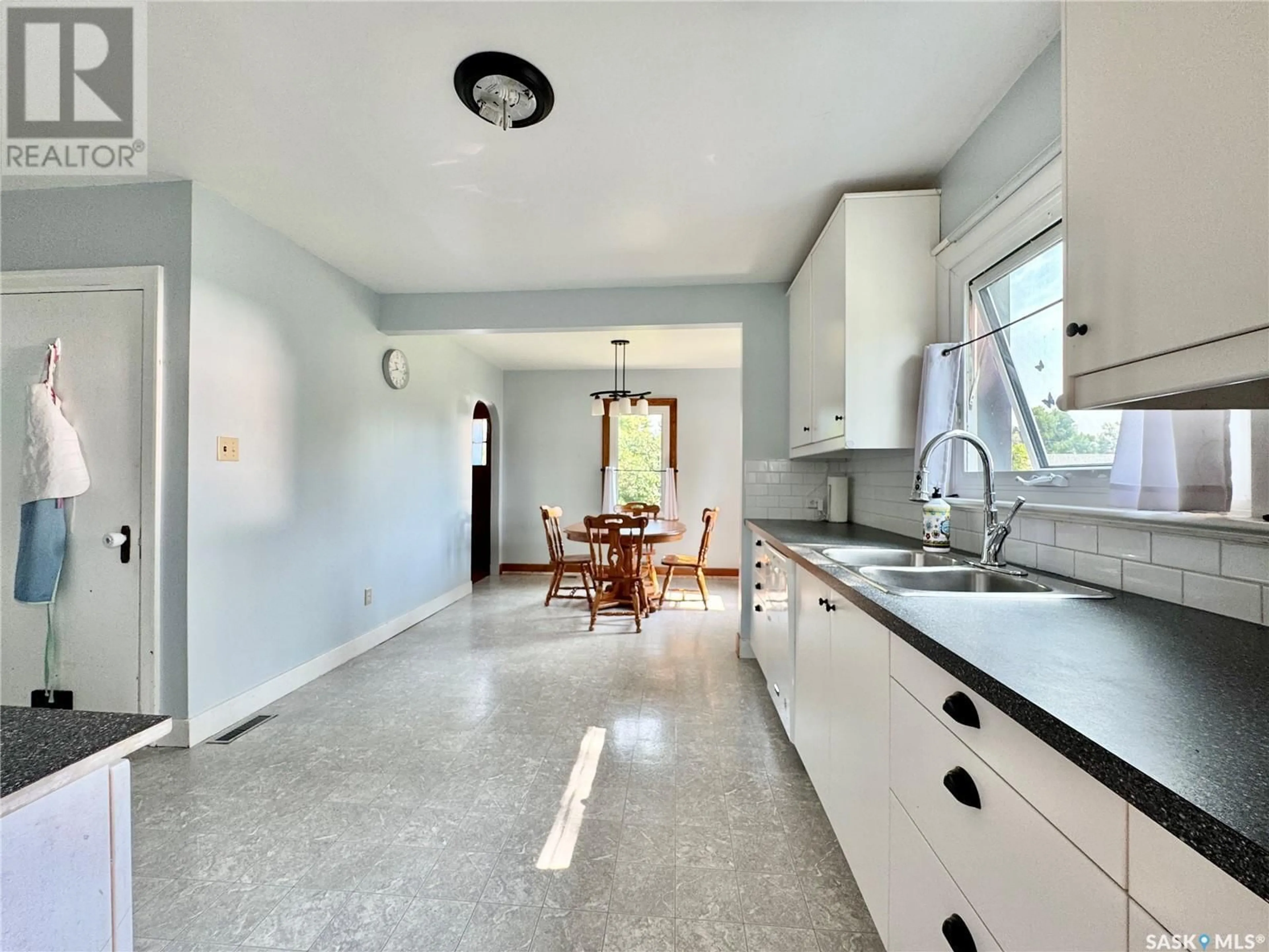 Open concept kitchen, unknown for E - 405 MARCH AVENUE, Langenburg Saskatchewan S0A0A0