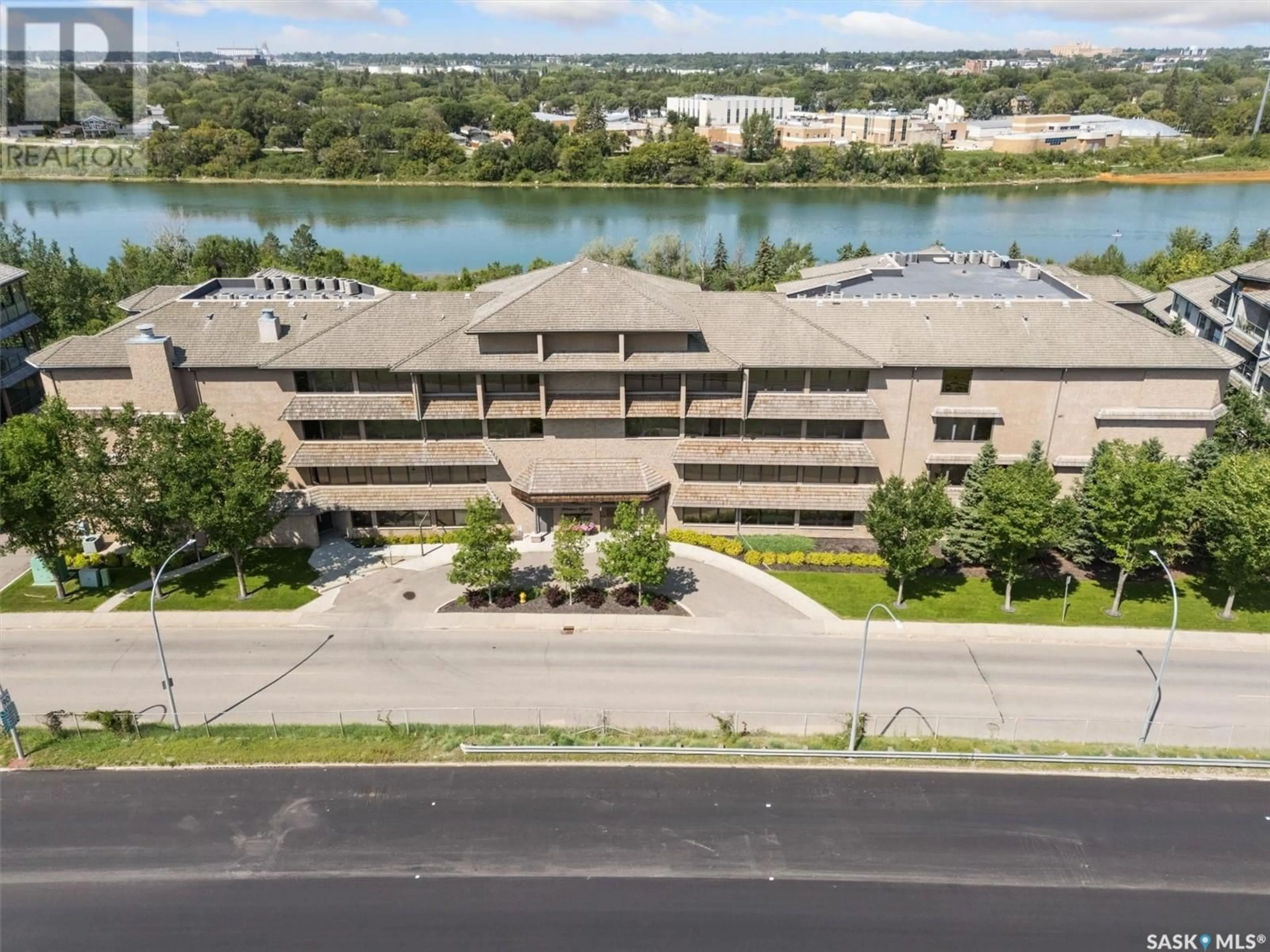 A pic from outside/outdoor area/front of a property/back of a property/a pic from drone, water/lake/river/ocean view for 236 623 SASKATCHEWAN CRESCENT, Saskatoon Saskatchewan S7M0A5