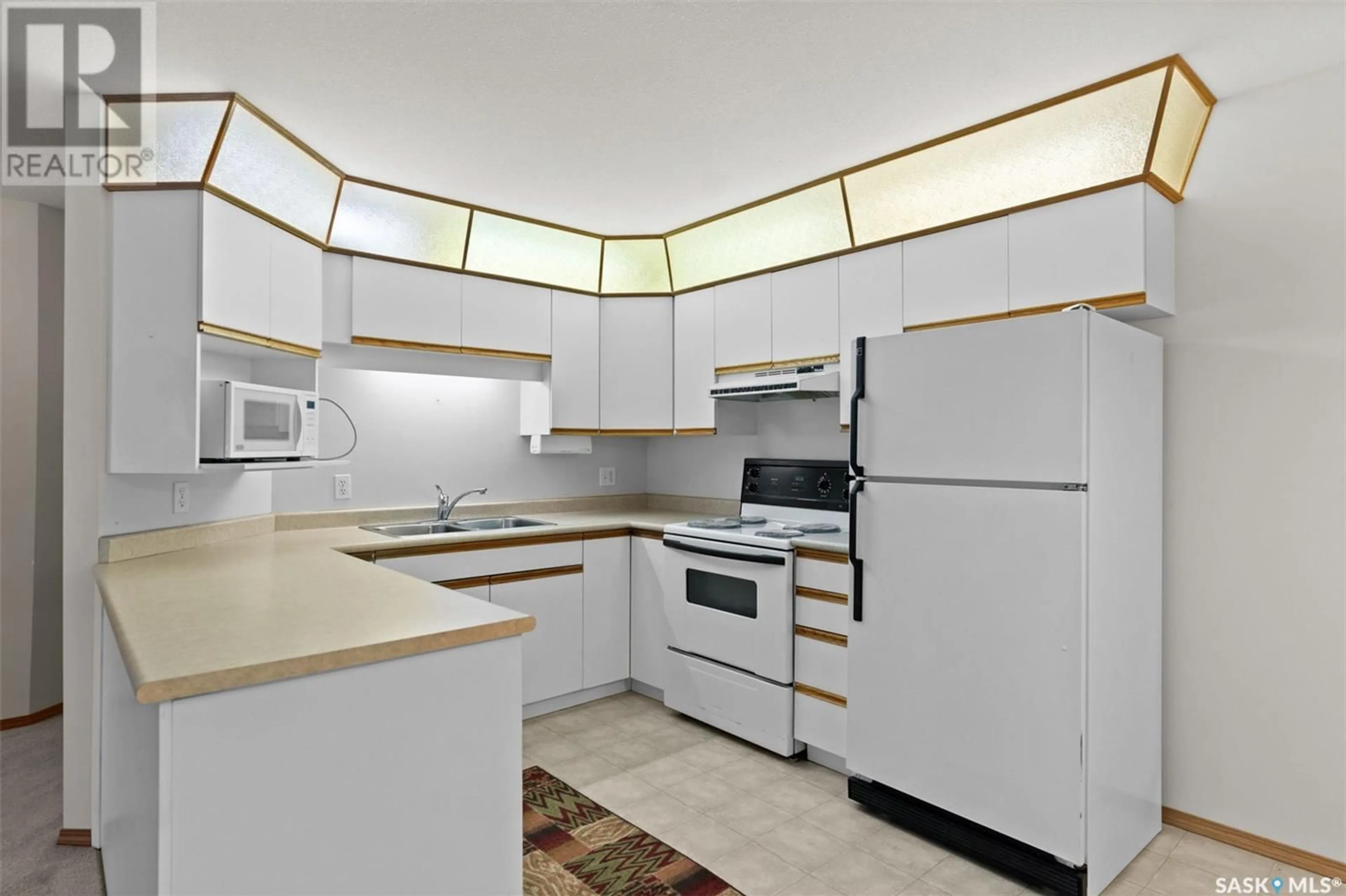 Standard kitchen, ceramic/tile floor for 101 214 ROSS AVENUE, Dalmeny Saskatchewan S0K1E0