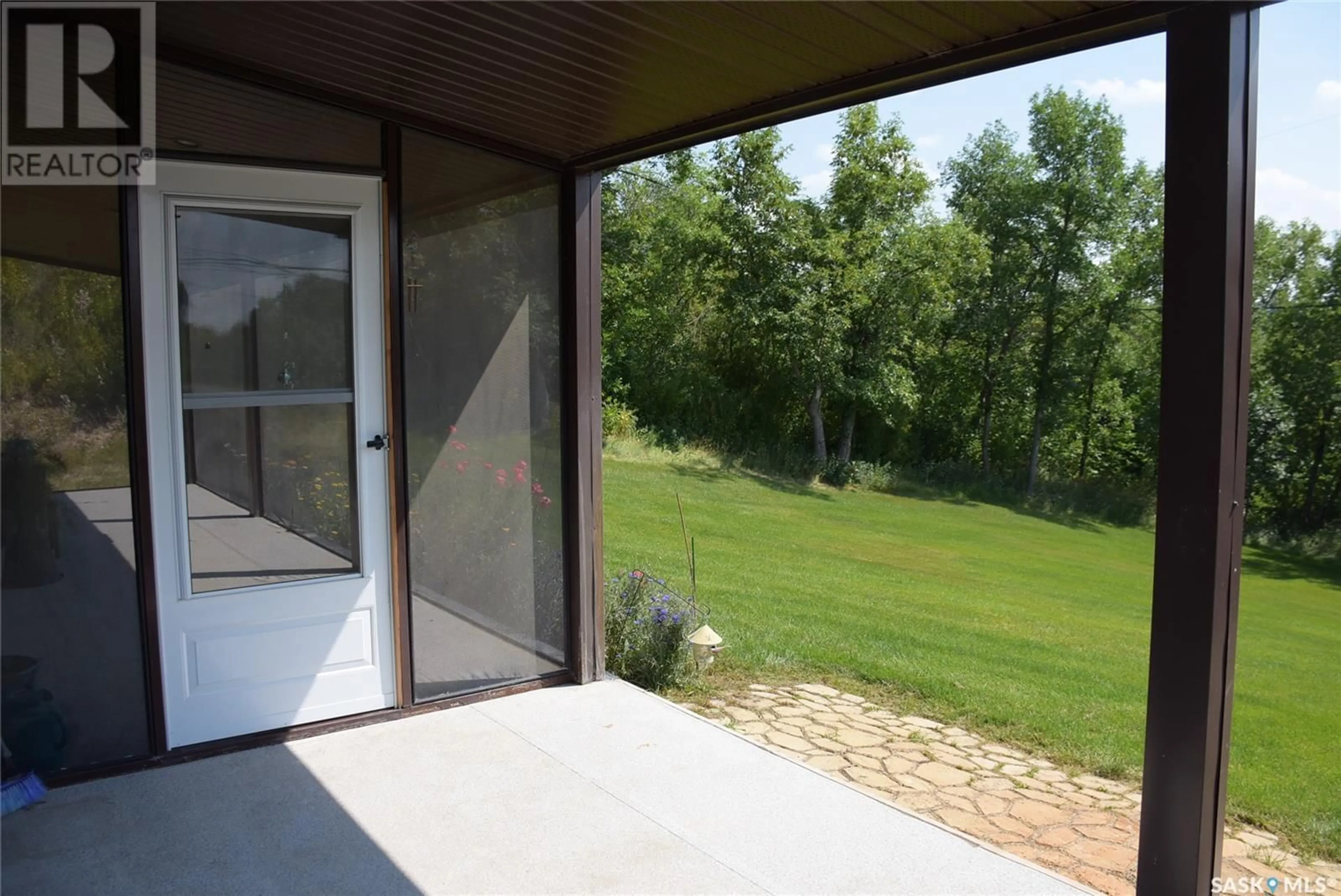 Patio, forest/trees view for 719 PASQUA LAKE ROAD, North Qu'Appelle Rm No. 187 Saskatchewan S0G1S0