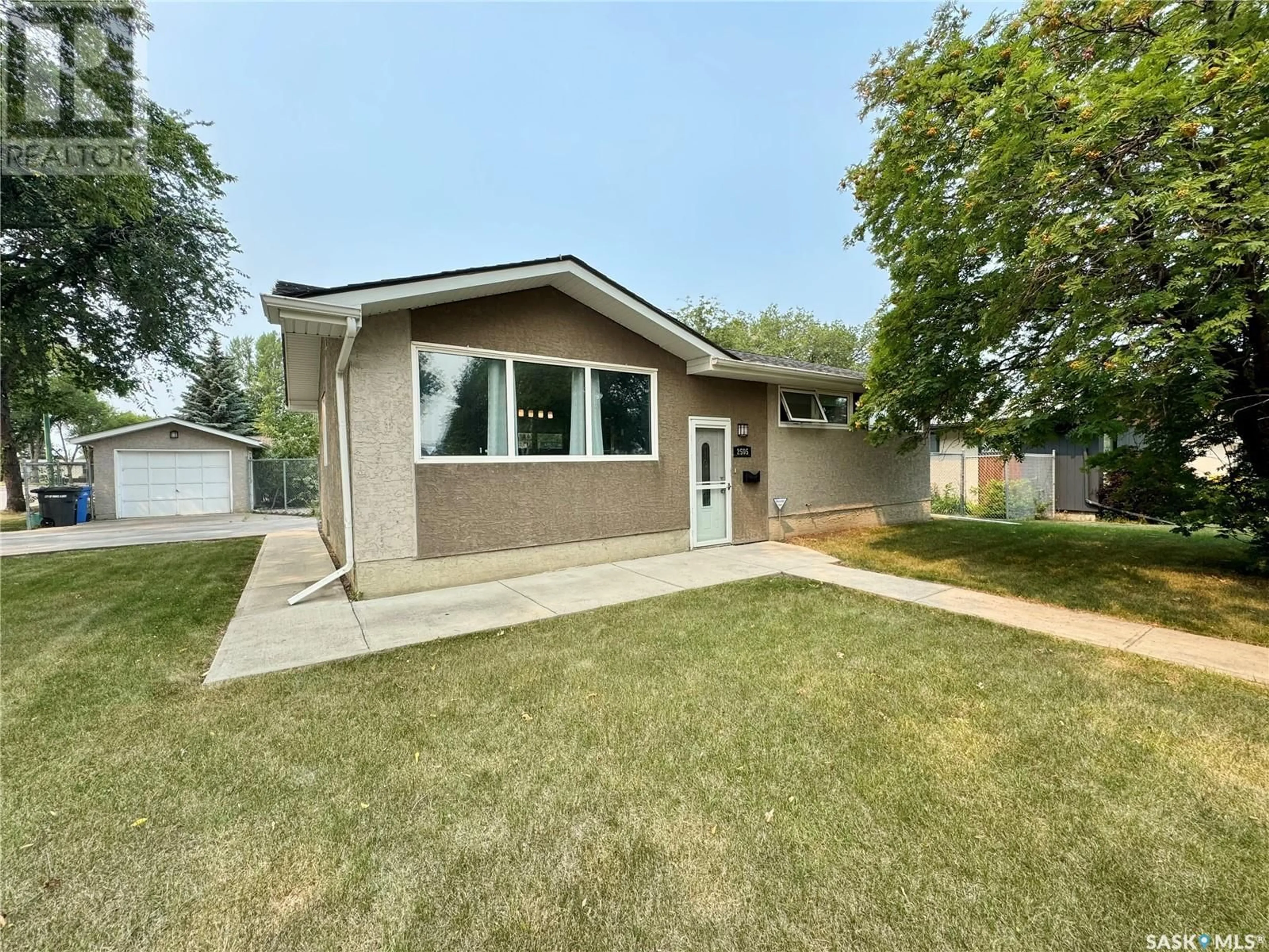 Home with vinyl exterior material, street for 2505 MCDONALD AVENUE, Prince Albert Saskatchewan S6V2V7