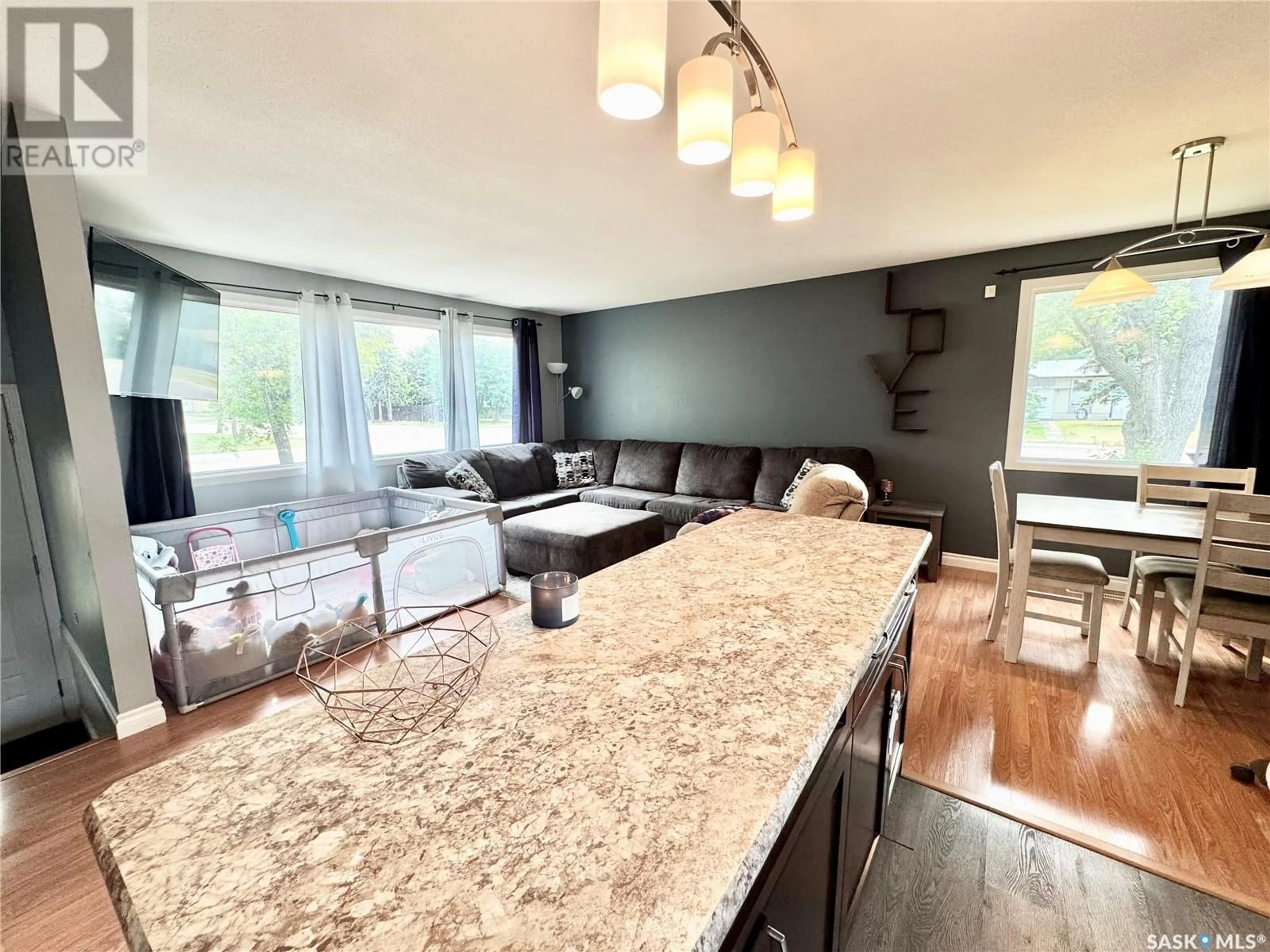 Open concept kitchen, wood/laminate floor for 2505 MCDONALD AVENUE, Prince Albert Saskatchewan S6V2V7