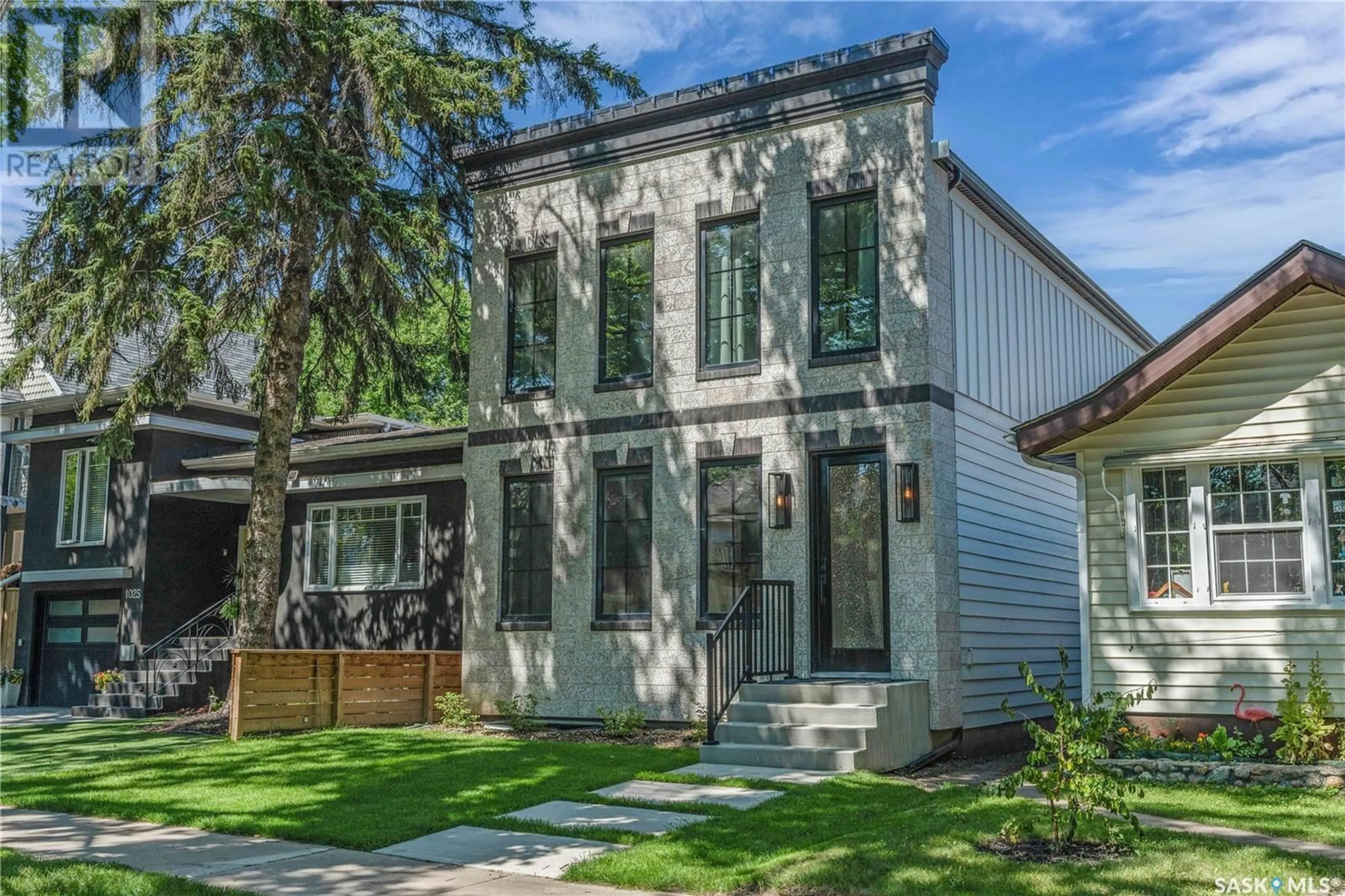 Home with vinyl exterior material, street for 1029 COLONY STREET, Saskatoon Saskatchewan S7N0S3