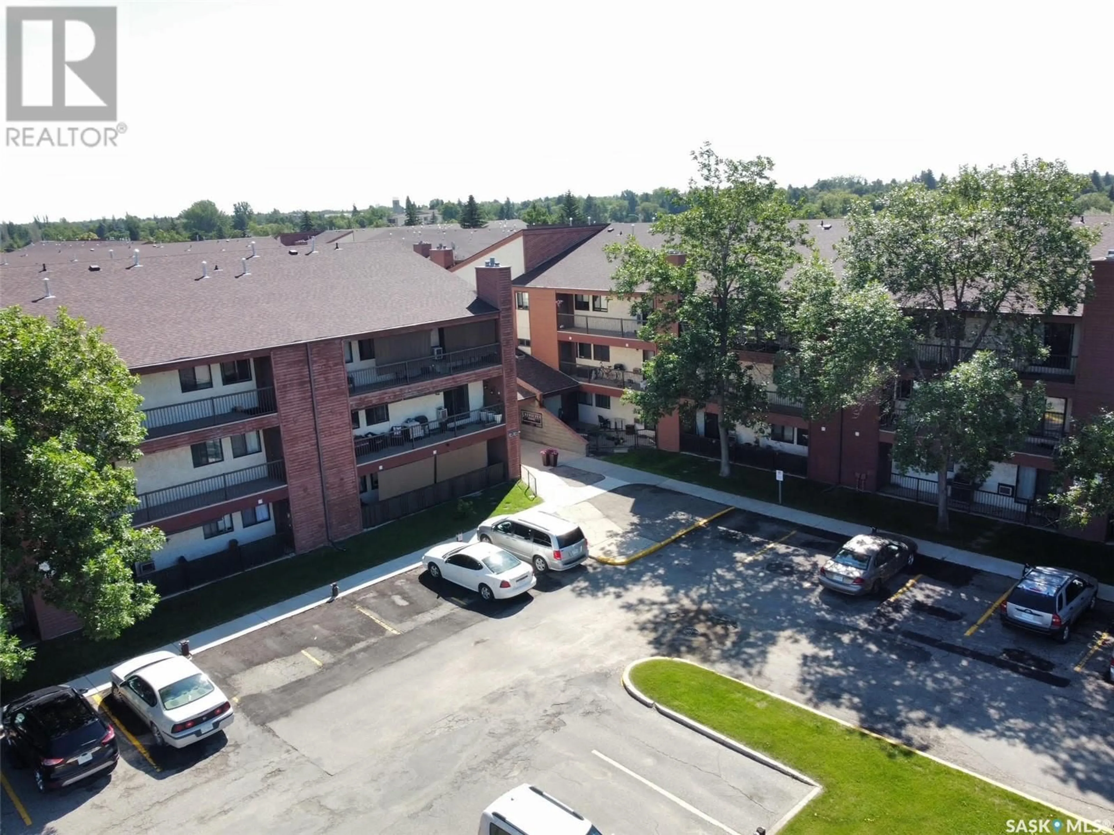 A pic from outside/outdoor area/front of a property/back of a property/a pic from drone, unknown for 205 - 3308 33RD STREET, Saskatoon Saskatchewan S7L6S6