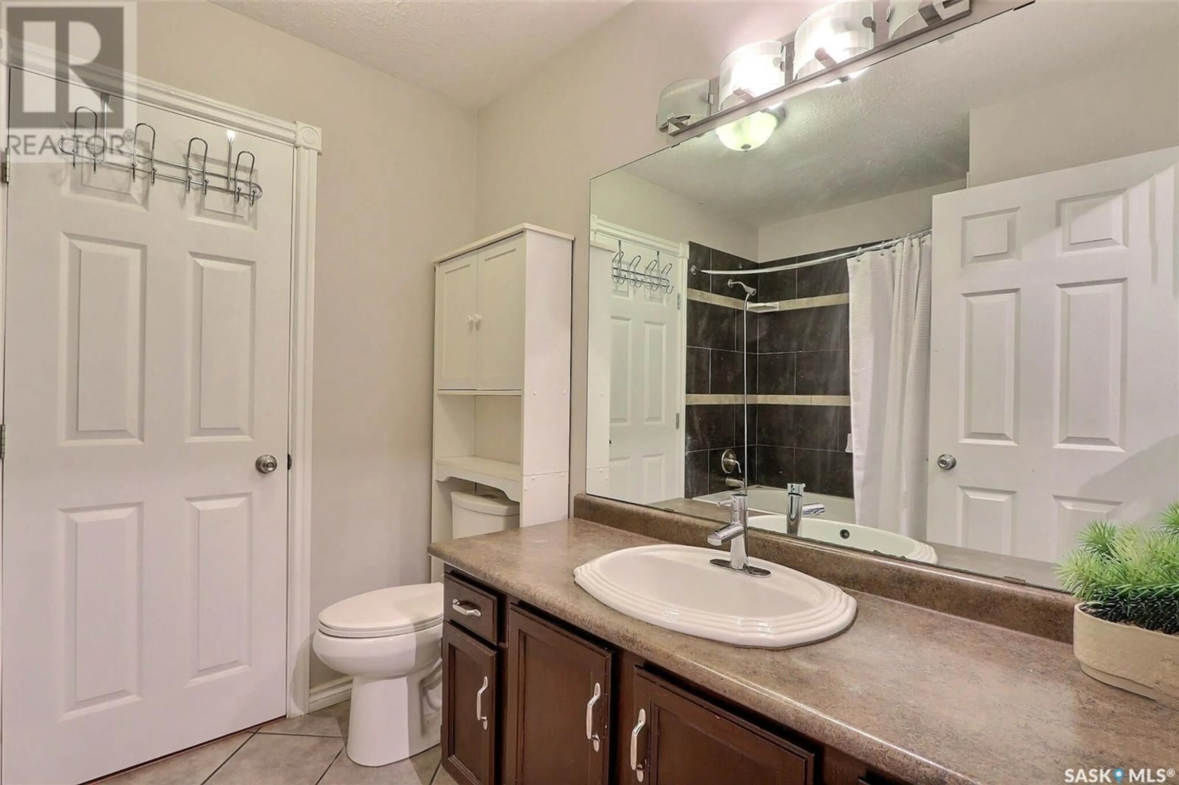Standard bathroom, ceramic/tile floor for 1699 ALLBRIGHT CRESCENT, Prince Albert Saskatchewan S6V7C3