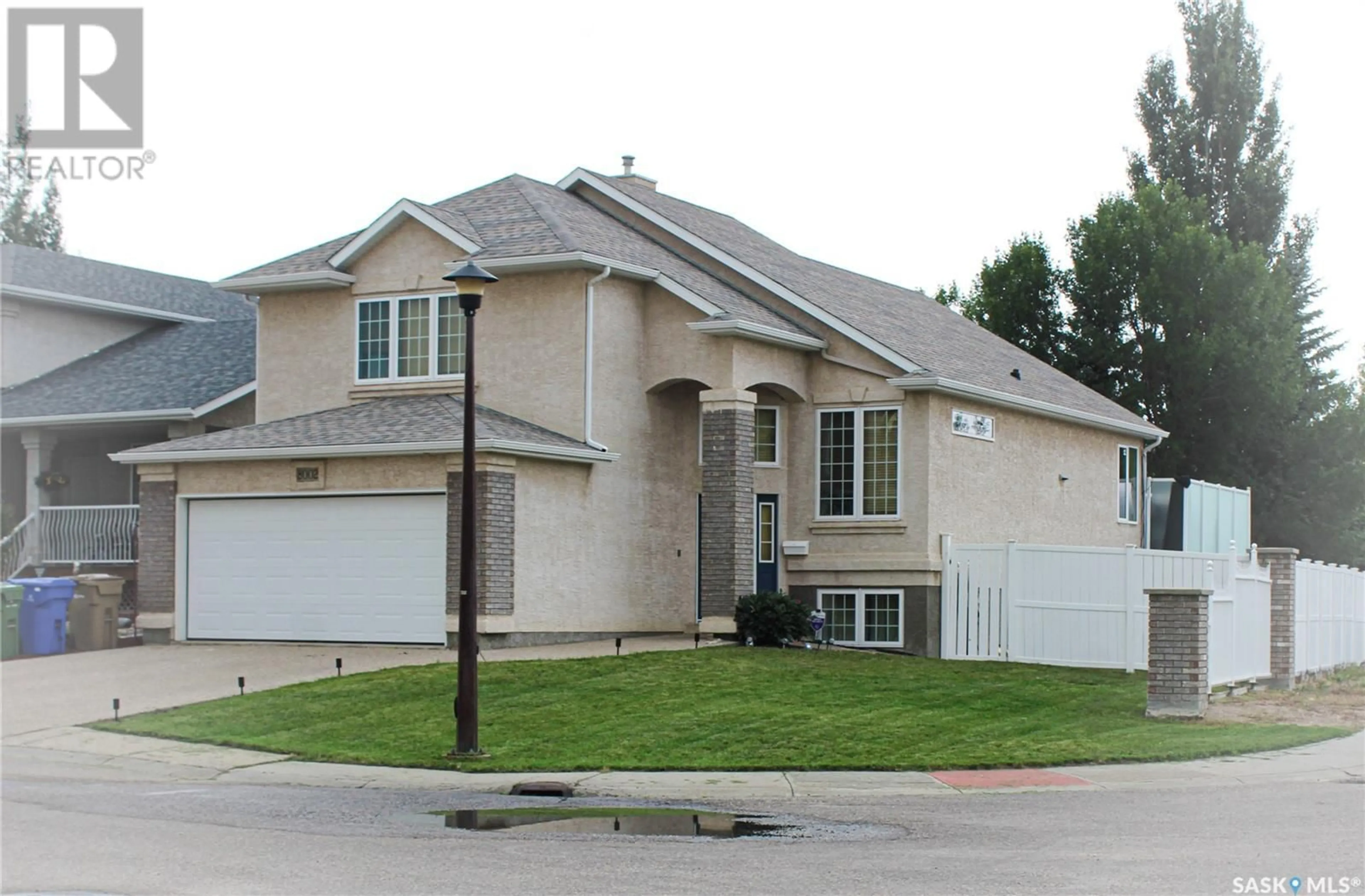 Home with vinyl exterior material, street for 8002 KNOX PLACE, Regina Saskatchewan S4Y1G5