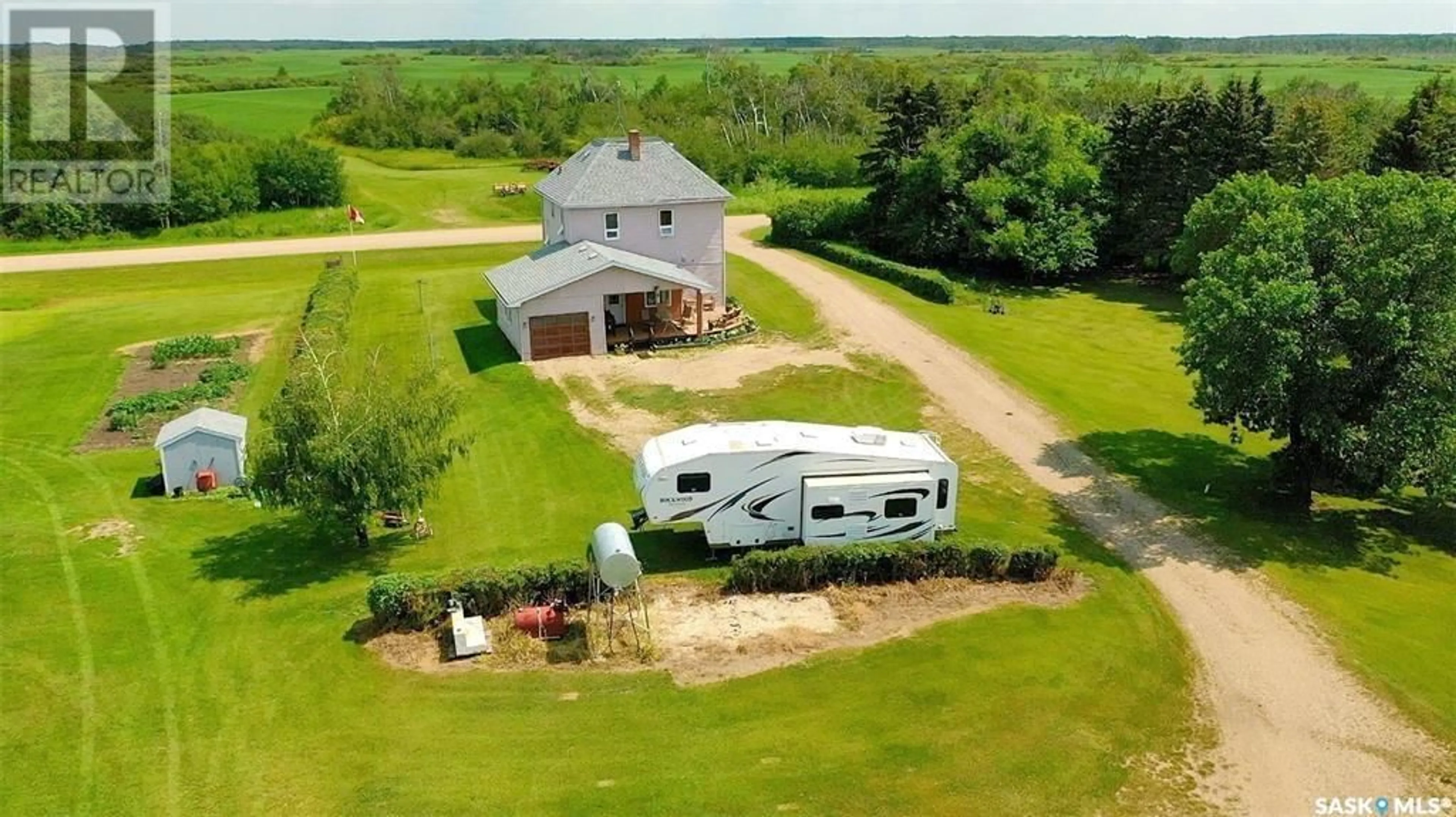 A pic from outside/outdoor area/front of a property/back of a property/a pic from drone, water/lake/river/ocean view for KENNY ACREAGE, Wolseley Rm No. 155 Saskatchewan S0G5H0