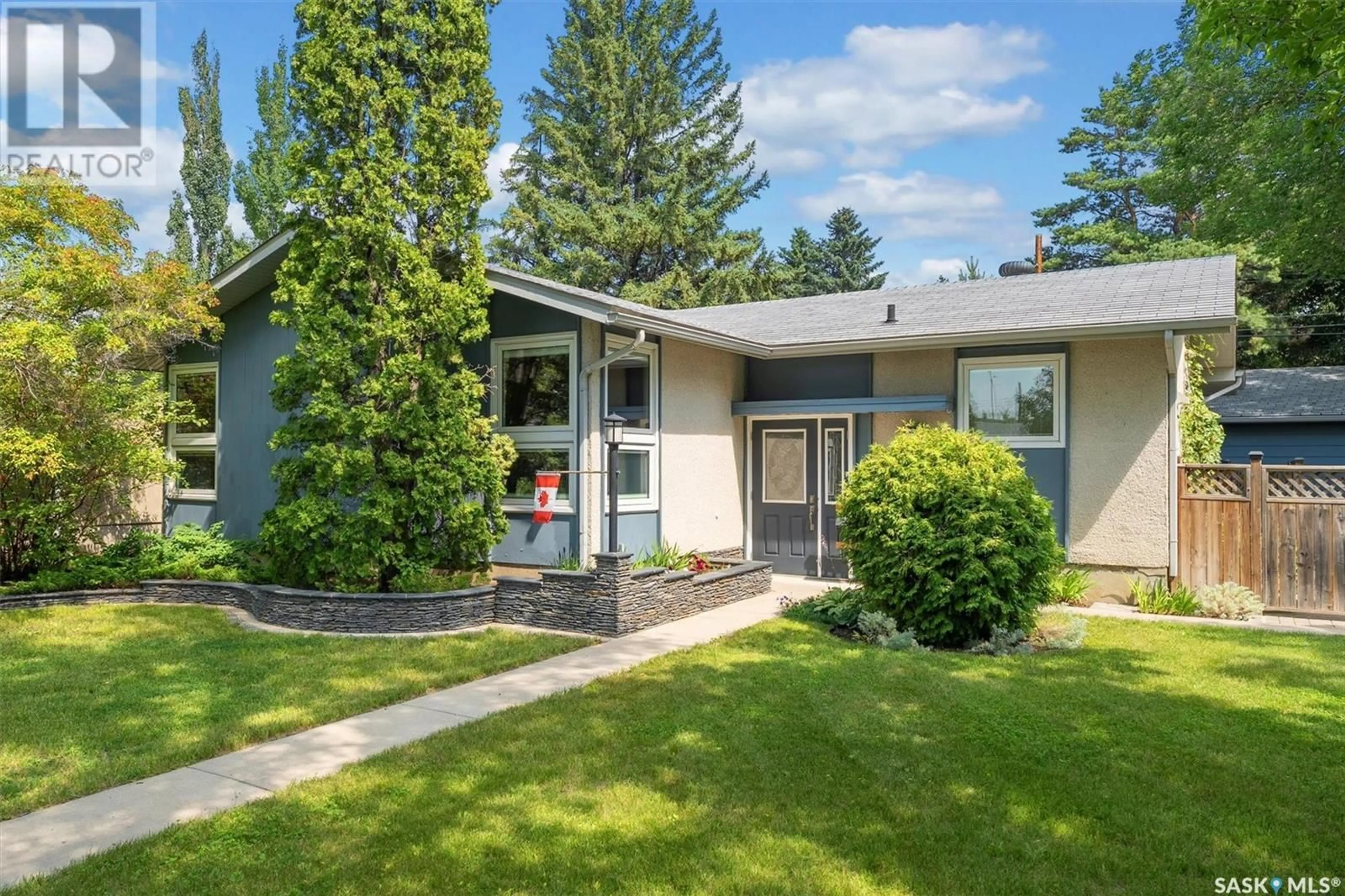 Home with vinyl exterior material, street for 35 SPINKS DRIVE, Saskatoon Saskatchewan S7H3W9