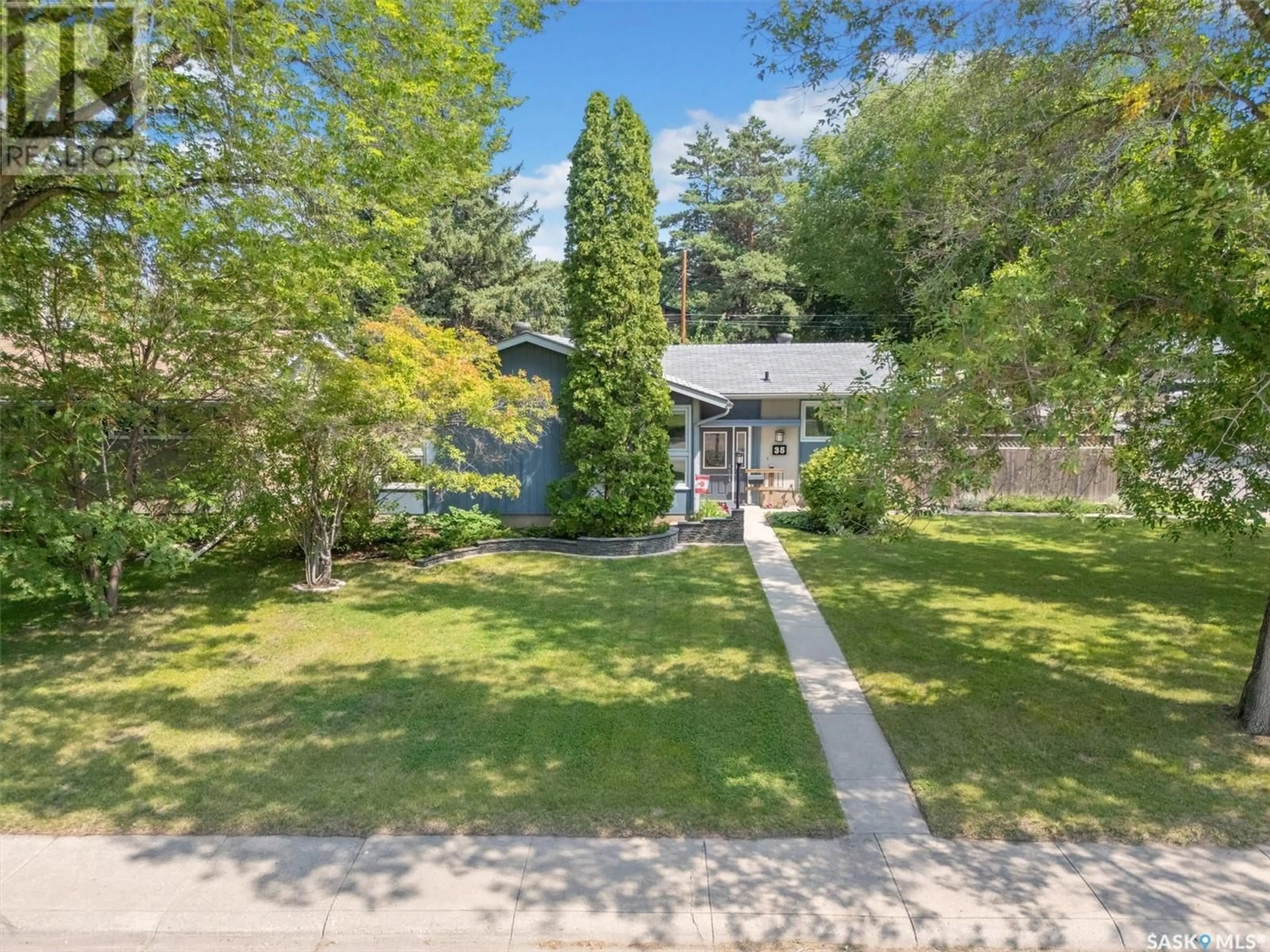A pic from outside/outdoor area/front of a property/back of a property/a pic from drone, street for 35 SPINKS DRIVE, Saskatoon Saskatchewan S7H3W9