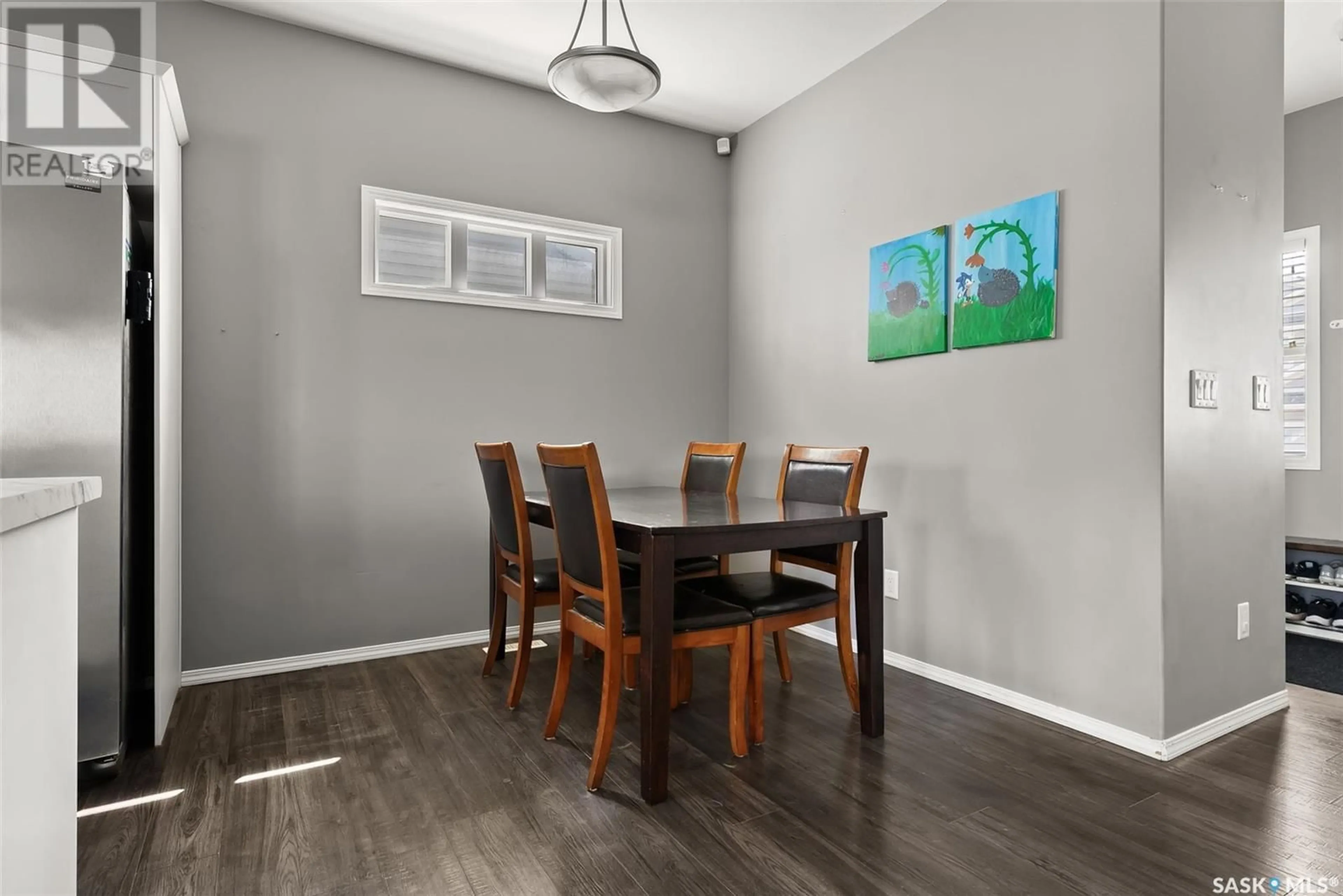 Dining room, wood/laminate floor for 5325 MCKENNA CRESCENT, Regina Saskatchewan S4W0H2