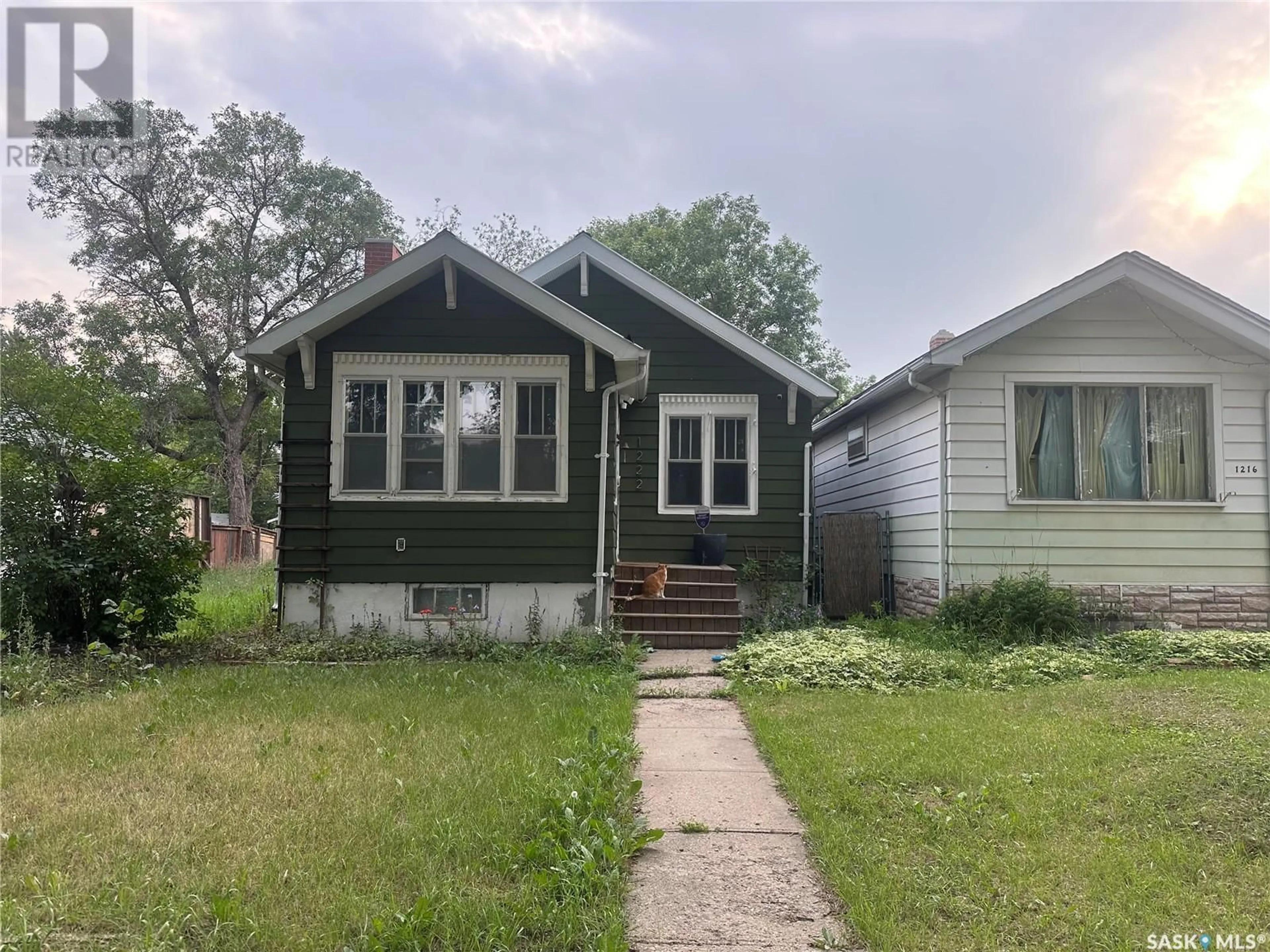 Home with vinyl exterior material, street for 1222 ROBINSON STREET, Regina Saskatchewan S4T2N2