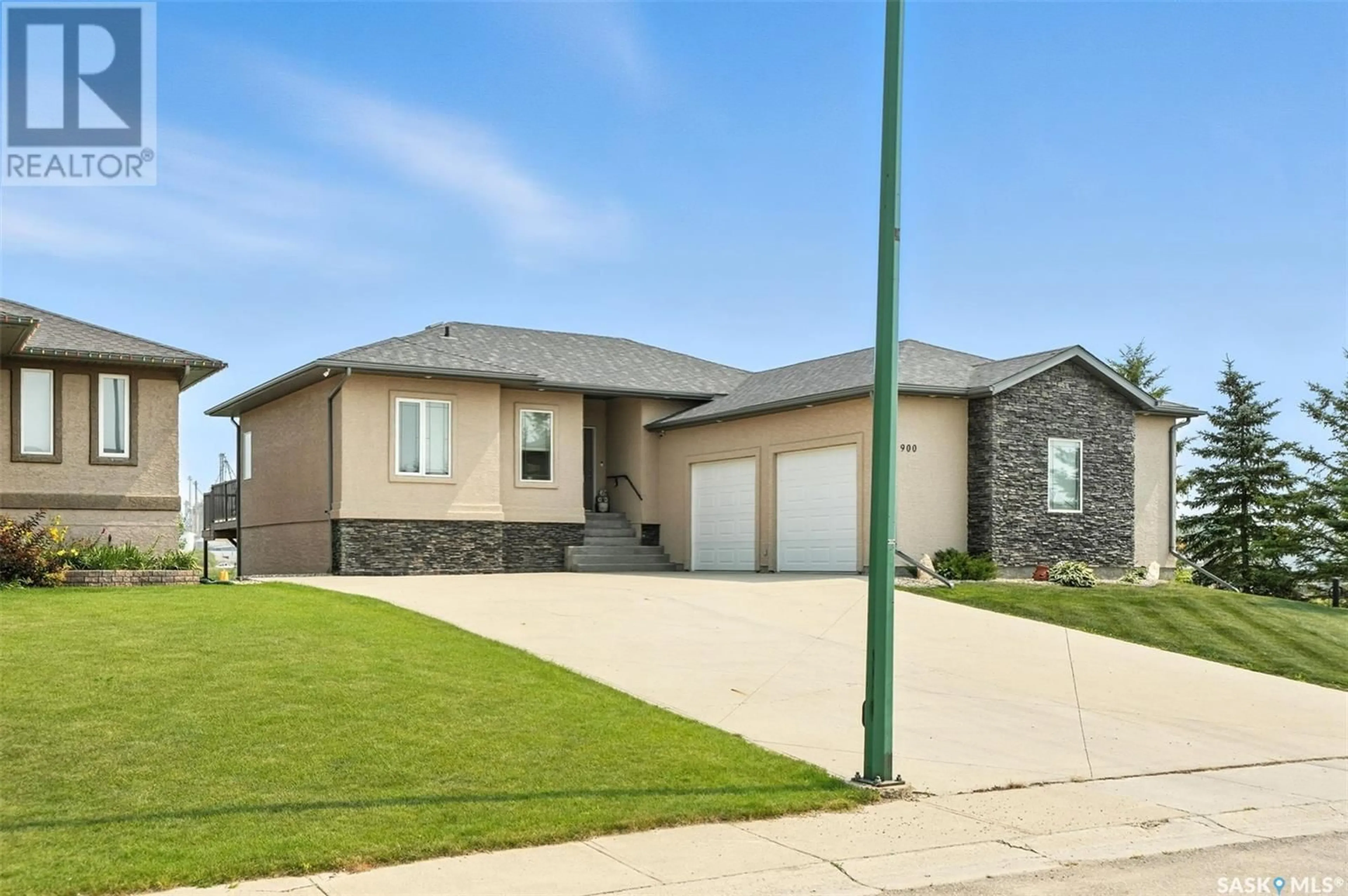 Home with brick exterior material, street for 900 WATER RIDGE CRESCENT, Humboldt Saskatchewan S0K2A0