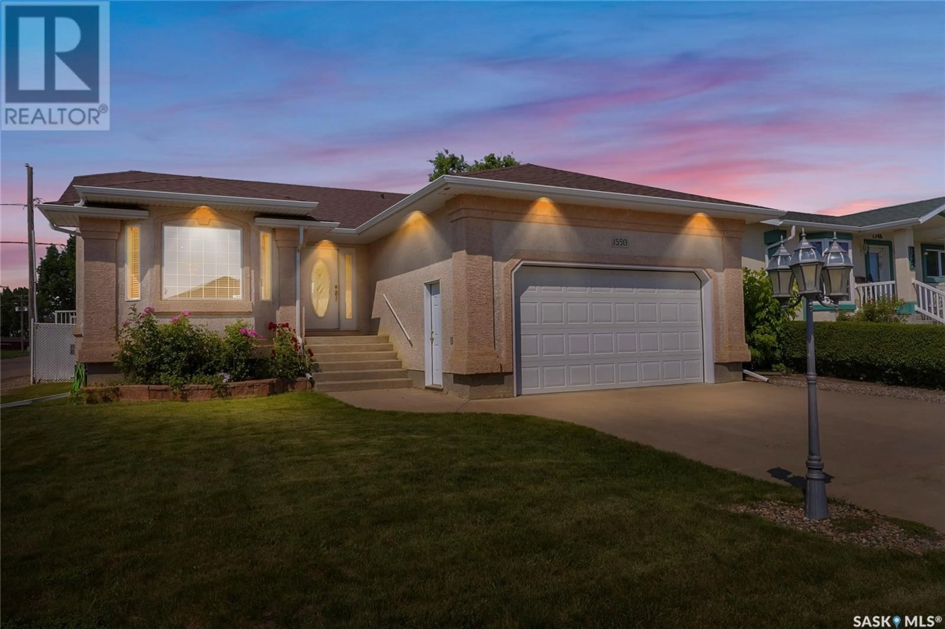Home with vinyl exterior material, street for 1550 ATHABASCA STREET, Moose Jaw Saskatchewan S6H7K4