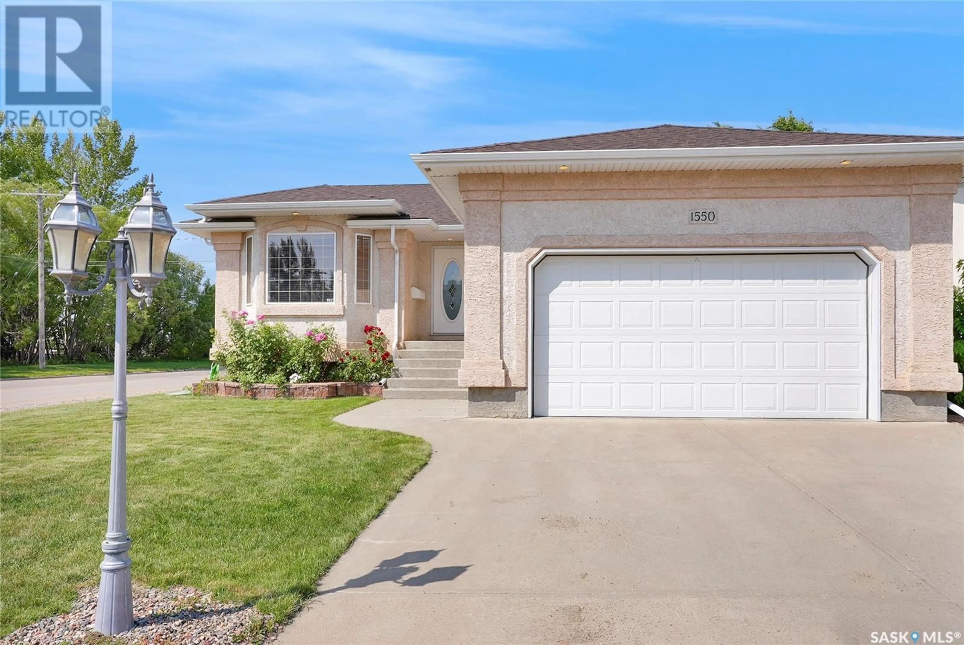 Home with vinyl exterior material, street for 1550 ATHABASCA STREET, Moose Jaw Saskatchewan S6H7K4