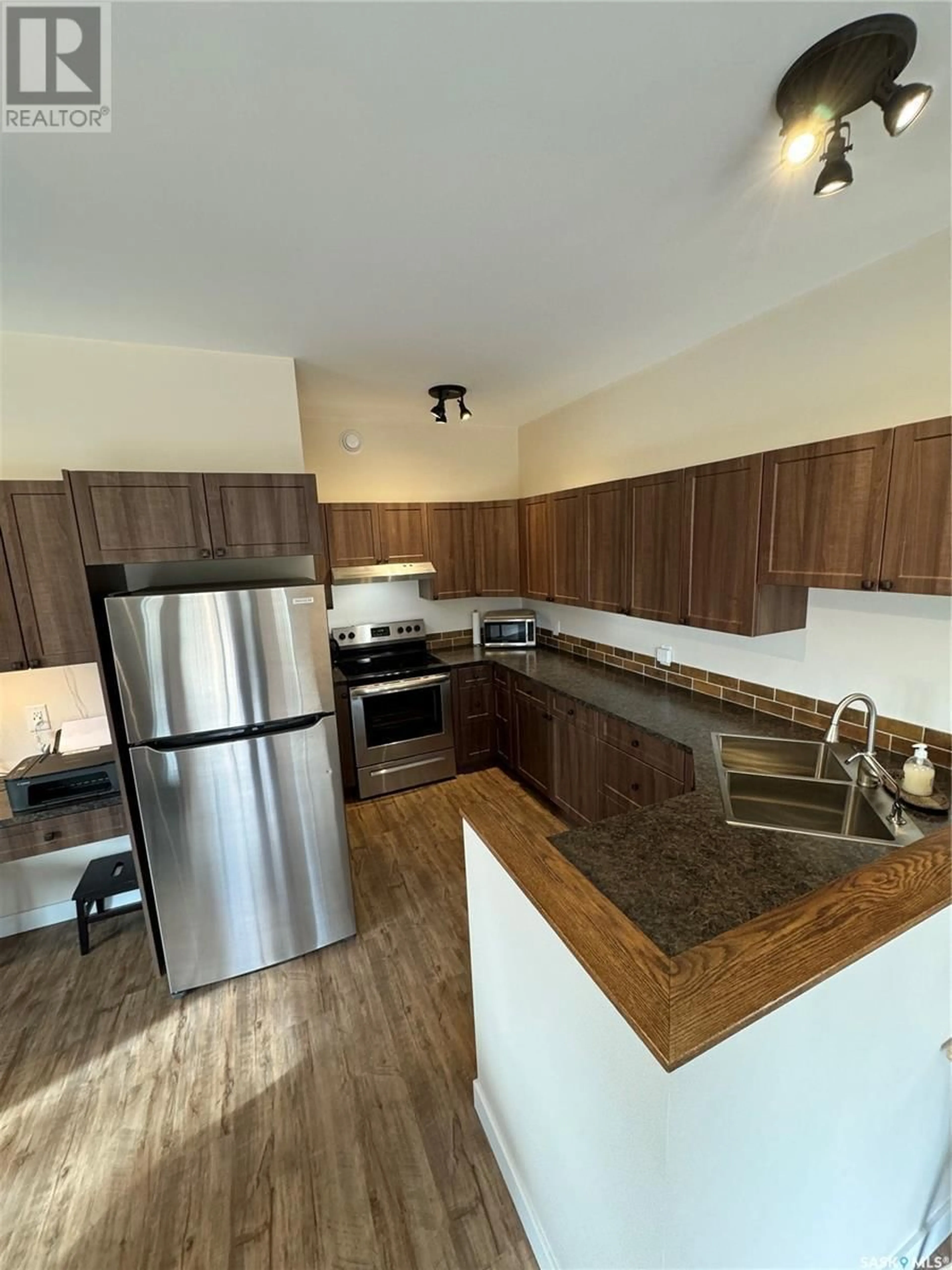 Standard kitchen, wood/laminate floor for 2.94 ACRES WITH ATTACHED GARAGE, Hudson Bay Rm No. 394 Saskatchewan S0E0Y0