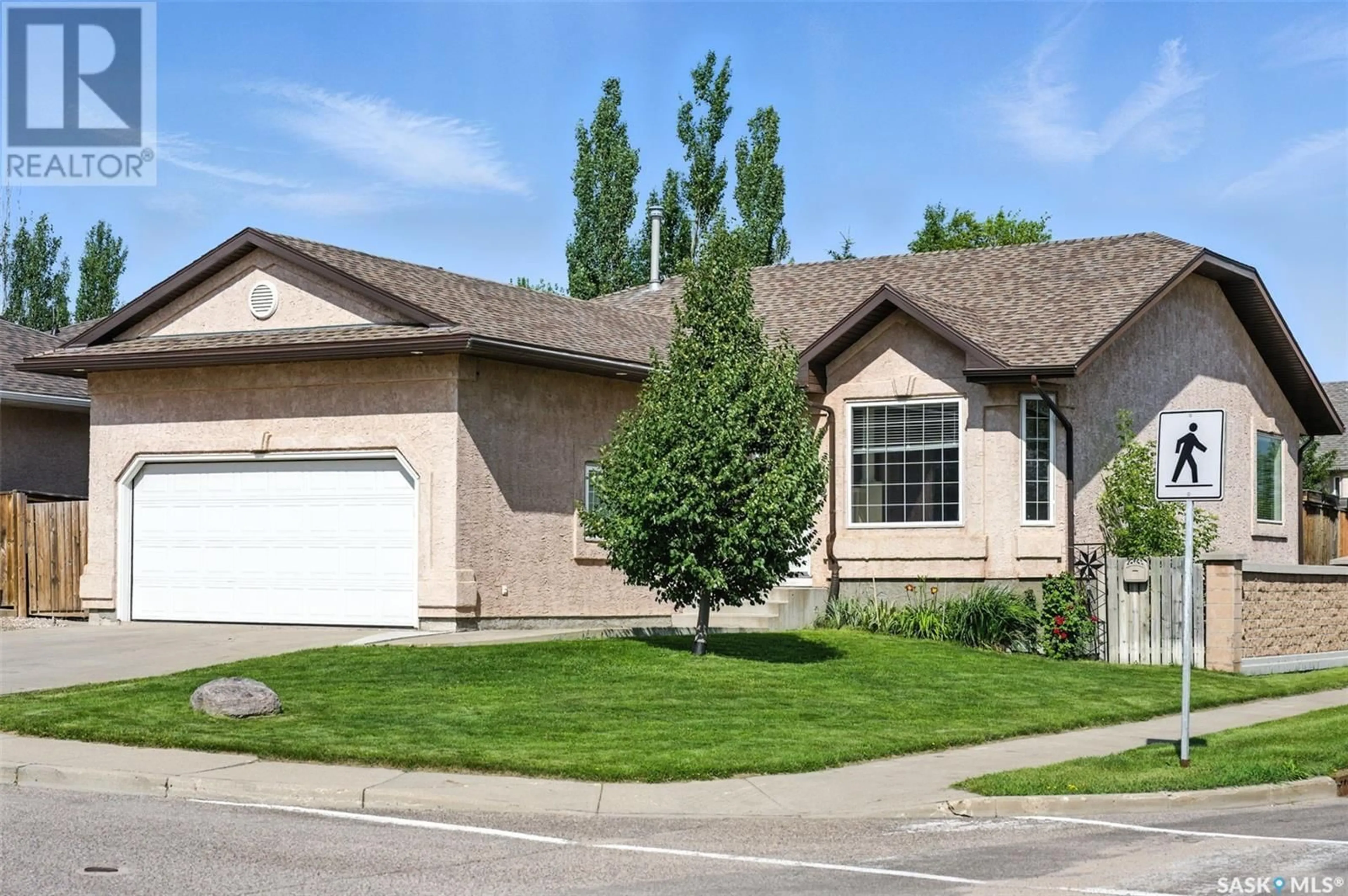 Home with vinyl exterior material, street for 102 BAYFIELD CRESCENT, Saskatoon Saskatchewan S7V1E3