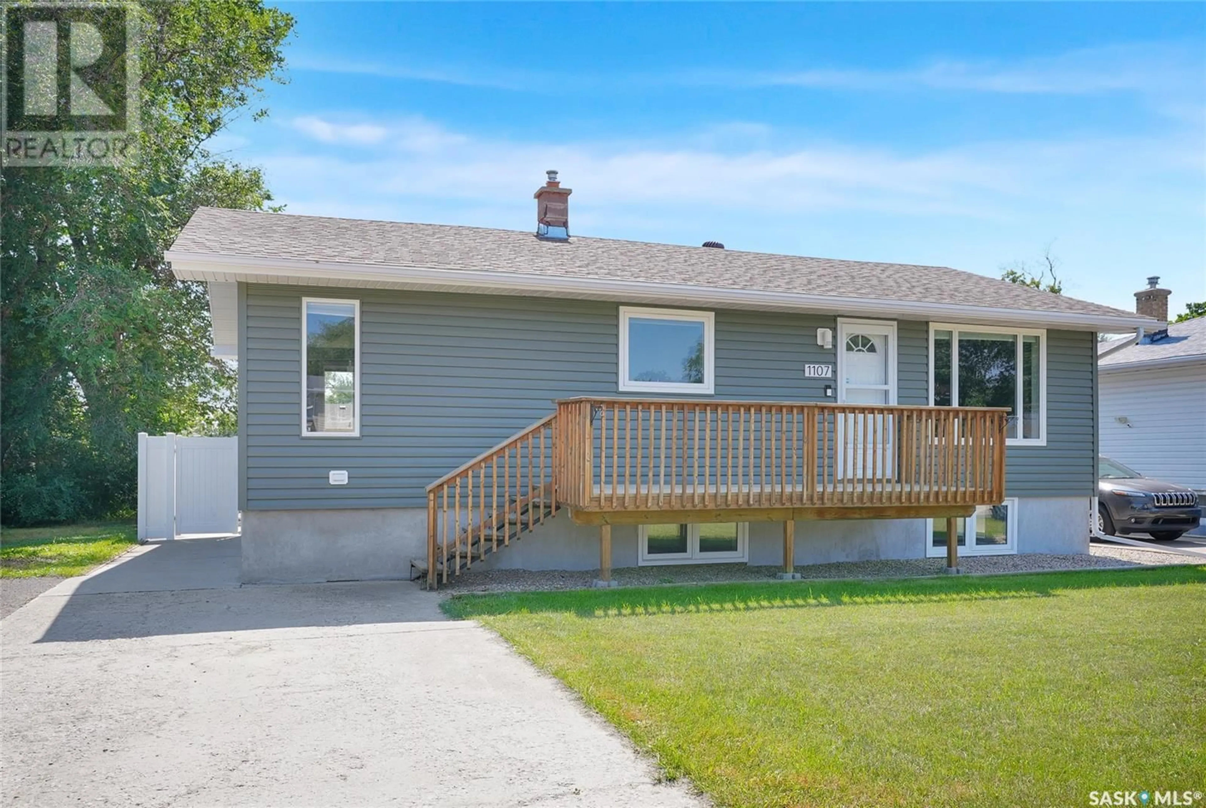 Home with vinyl exterior material, street for 1107 MONTGOMERY STREET, Moose Jaw Saskatchewan S6H2X2