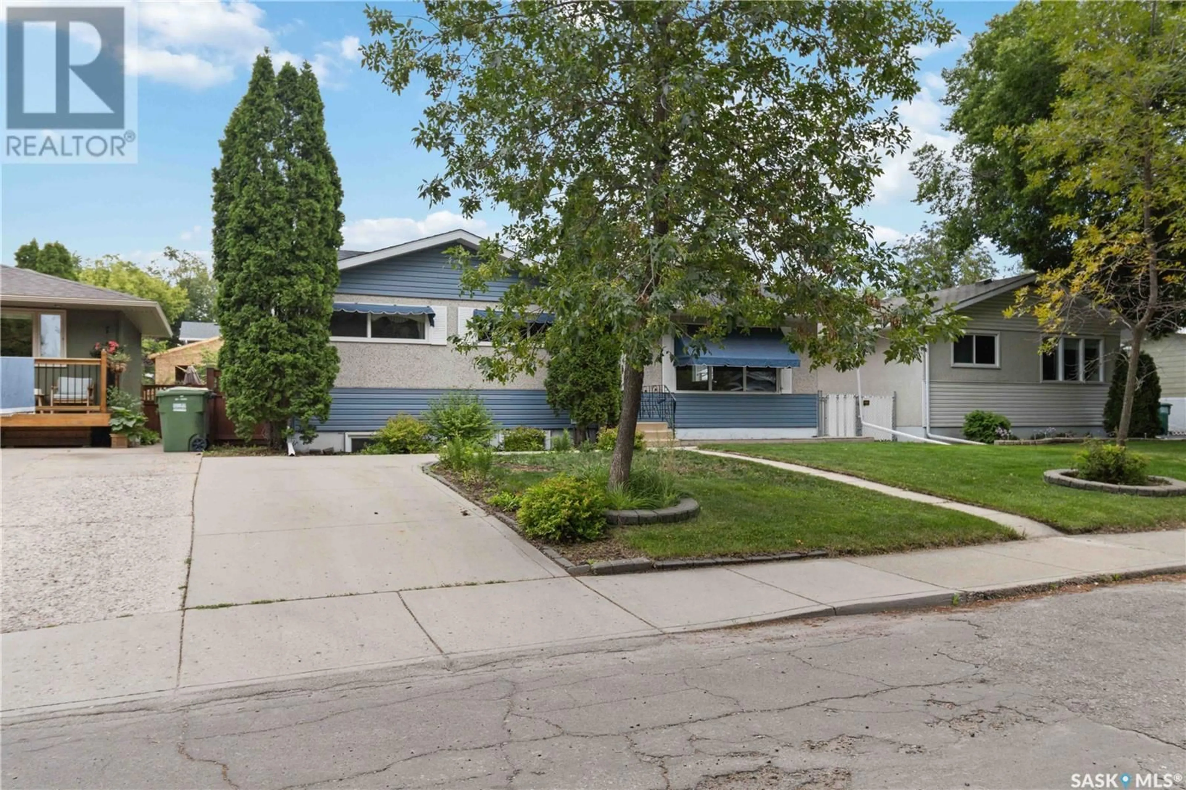 Home with vinyl exterior material, street for 106 PHILLIPS CRESCENT, Saskatoon Saskatchewan S7H3N1