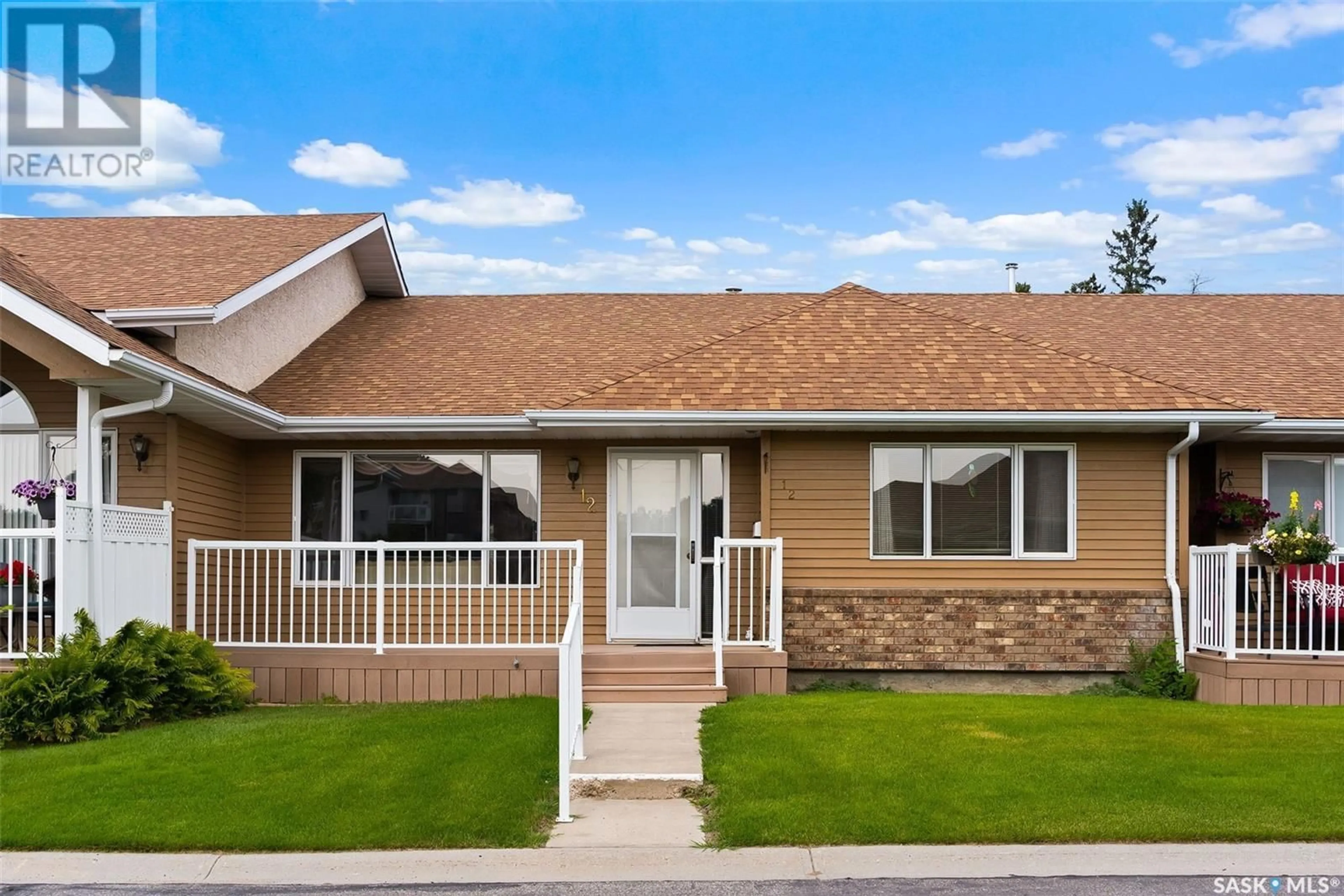 Home with vinyl exterior material, street for 12 KENSINGTON CRESCENT, Regina Saskatchewan S4S7G6