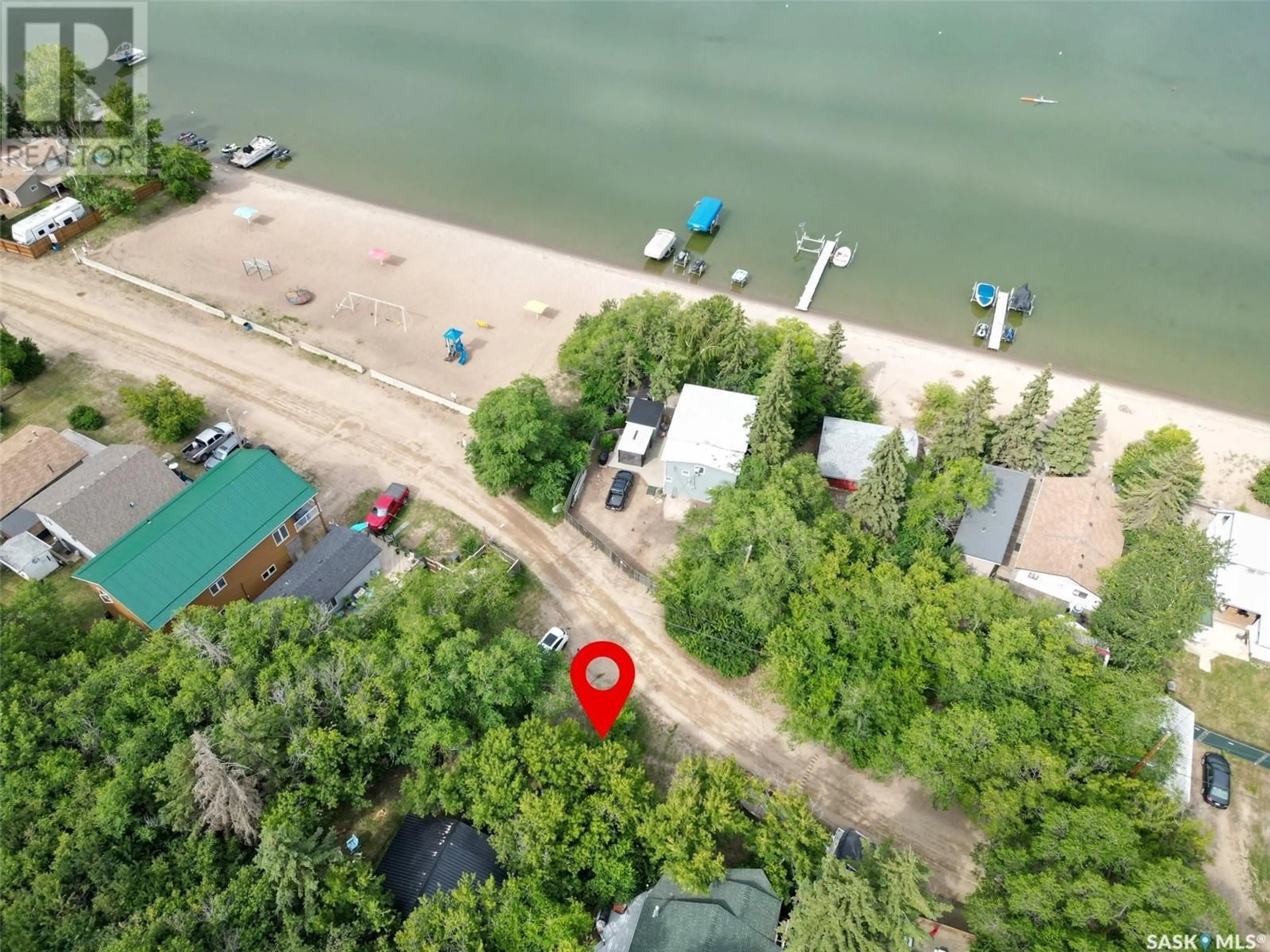 A pic from outside/outdoor area/front of a property/back of a property/a pic from drone, water/lake/river/ocean view for 8591 HUNTS COVE CRESCENT, Cochin Saskatchewan S0M0L0