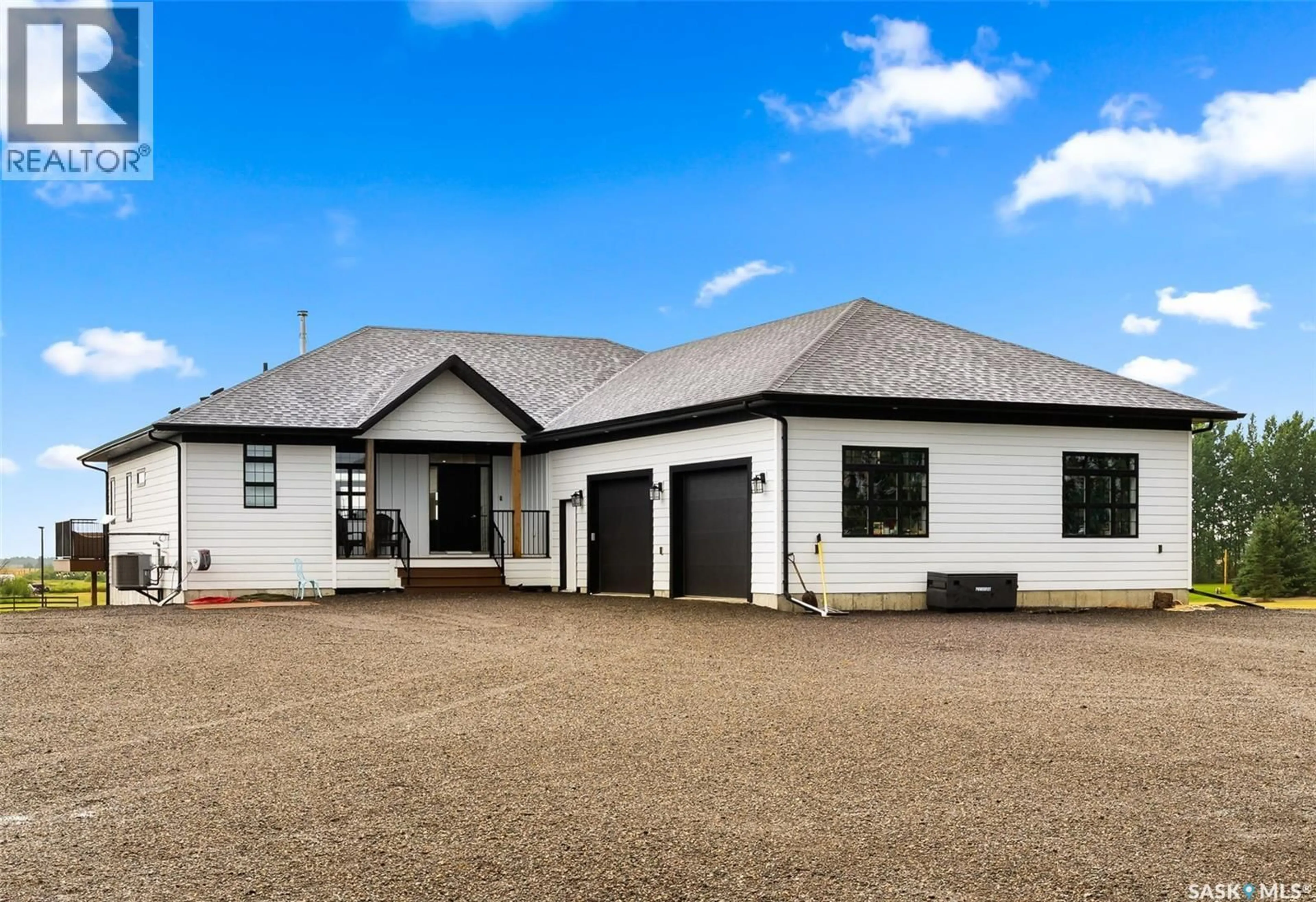 A pic from outside/outdoor area/front of a property/back of a property/a pic from drone, building for Hill Acreage BOHACH BAY, Edenwold Rm No.158 Saskatchewan S4L5B1