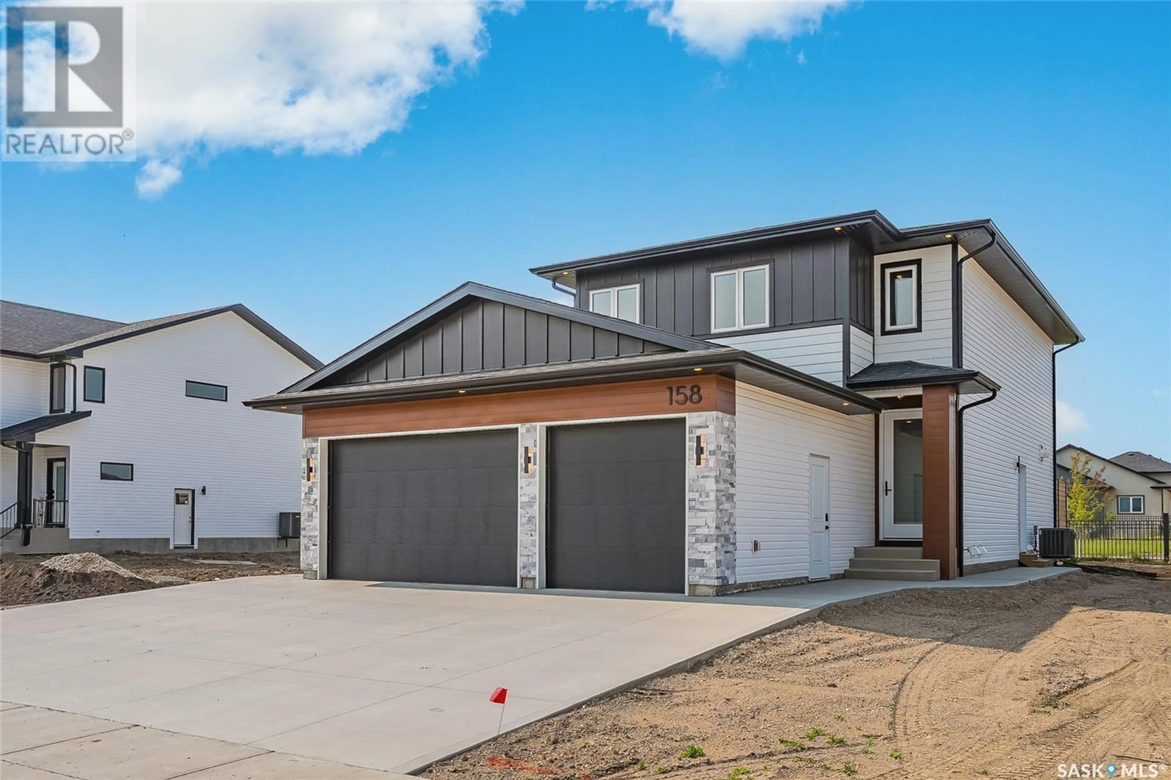 Home with brick exterior material, street for 158 HAVERSTOCK CRESCENT, Saskatoon Saskatchewan S7W1E3