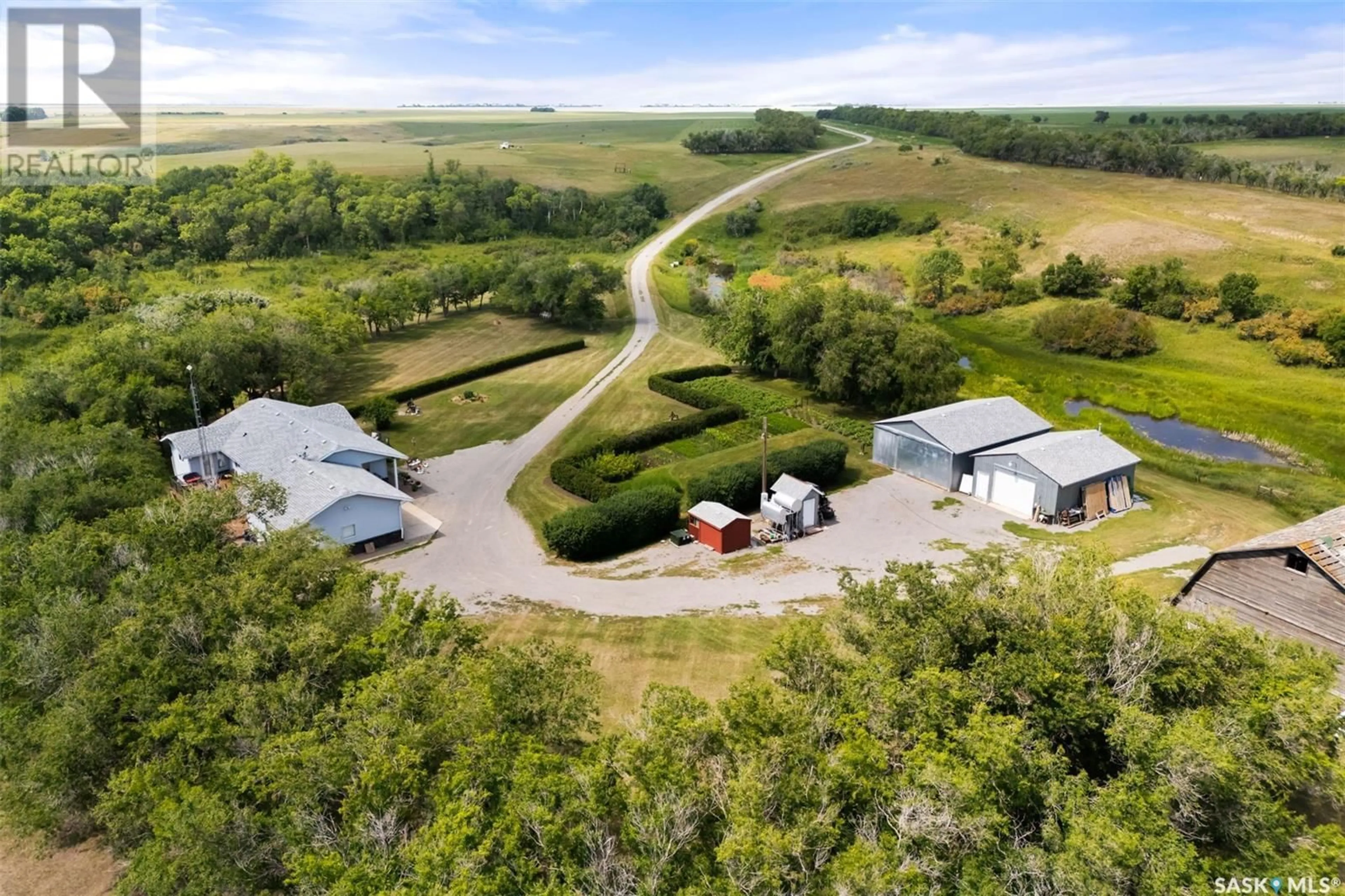 A pic from outside/outdoor area/front of a property/back of a property/a pic from drone, unknown for KINGSTON VALLEY ACREAGE, Lumsden Rm No. 189 Saskatchewan S0G3C0
