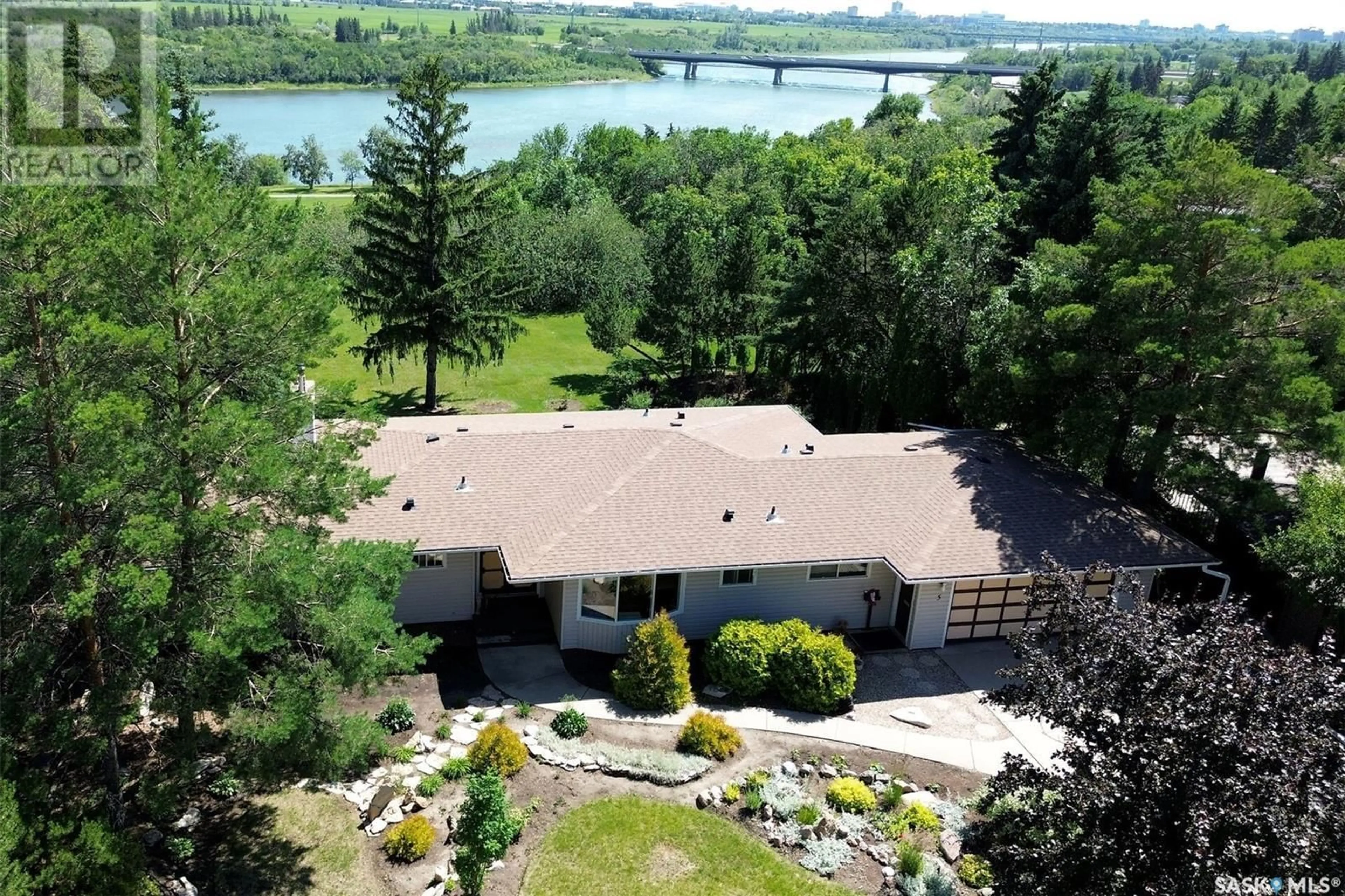 A pic from outside/outdoor area/front of a property/back of a property/a pic from drone, water/lake/river/ocean view for 5 QU'APPELLE COURT, Saskatoon Saskatchewan S7K1C2