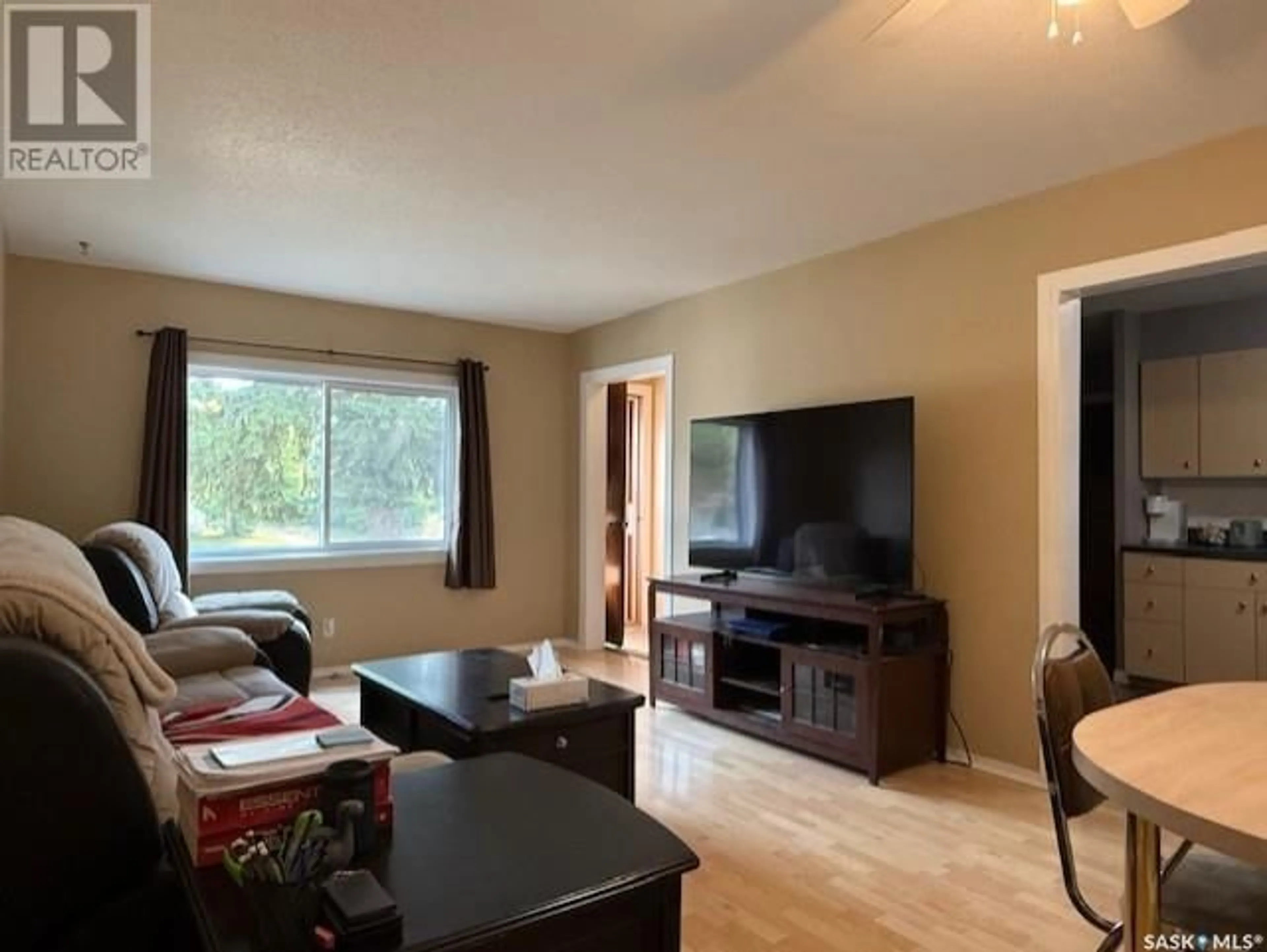 Living room with furniture, wood/laminate floor for 375 SCOTIA STREET, Melville Saskatchewan S0A2P0