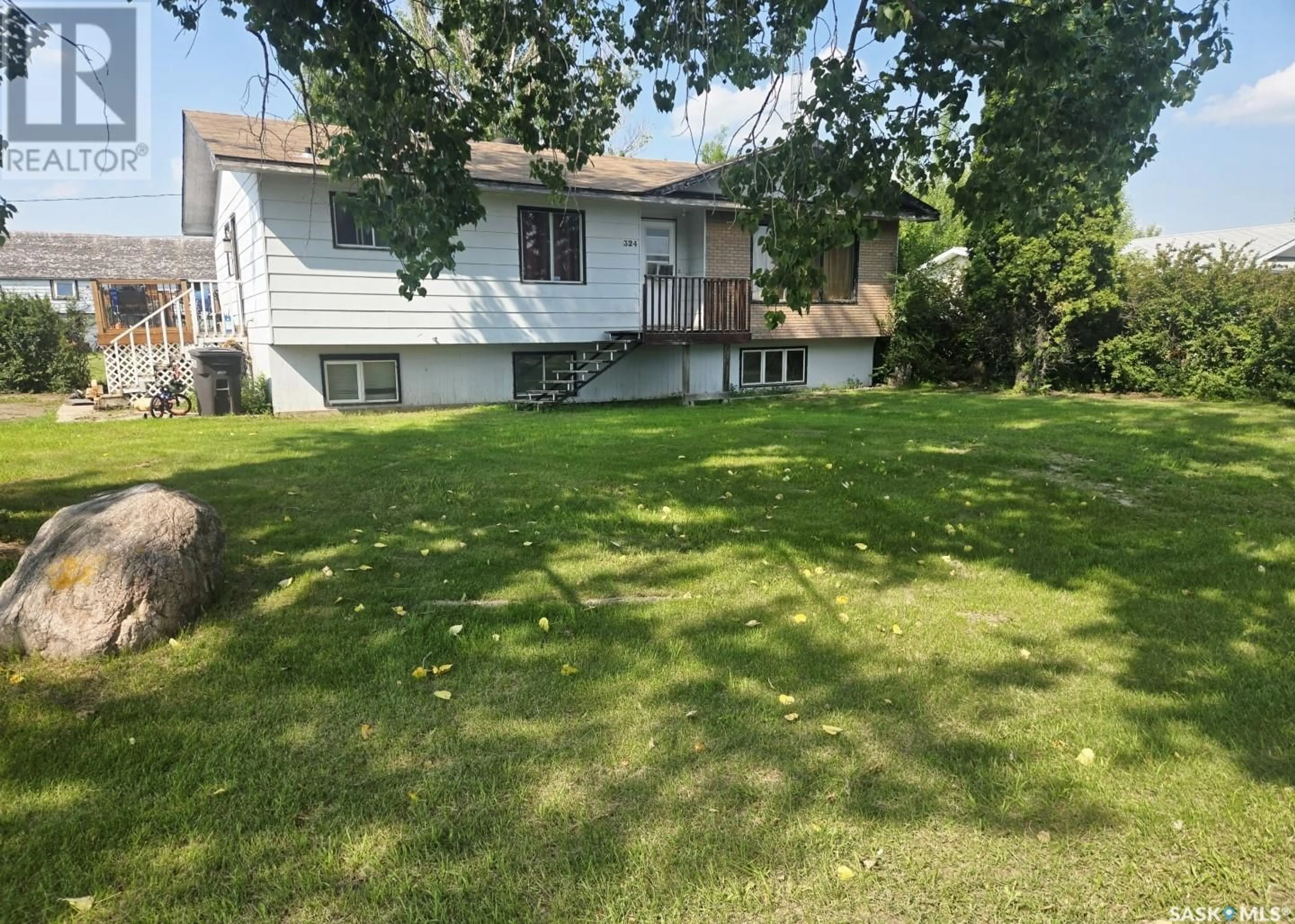 A pic from outside/outdoor area/front of a property/back of a property/a pic from drone, unknown for 324 NORREYS STREET, Drake Saskatchewan S0K1H0