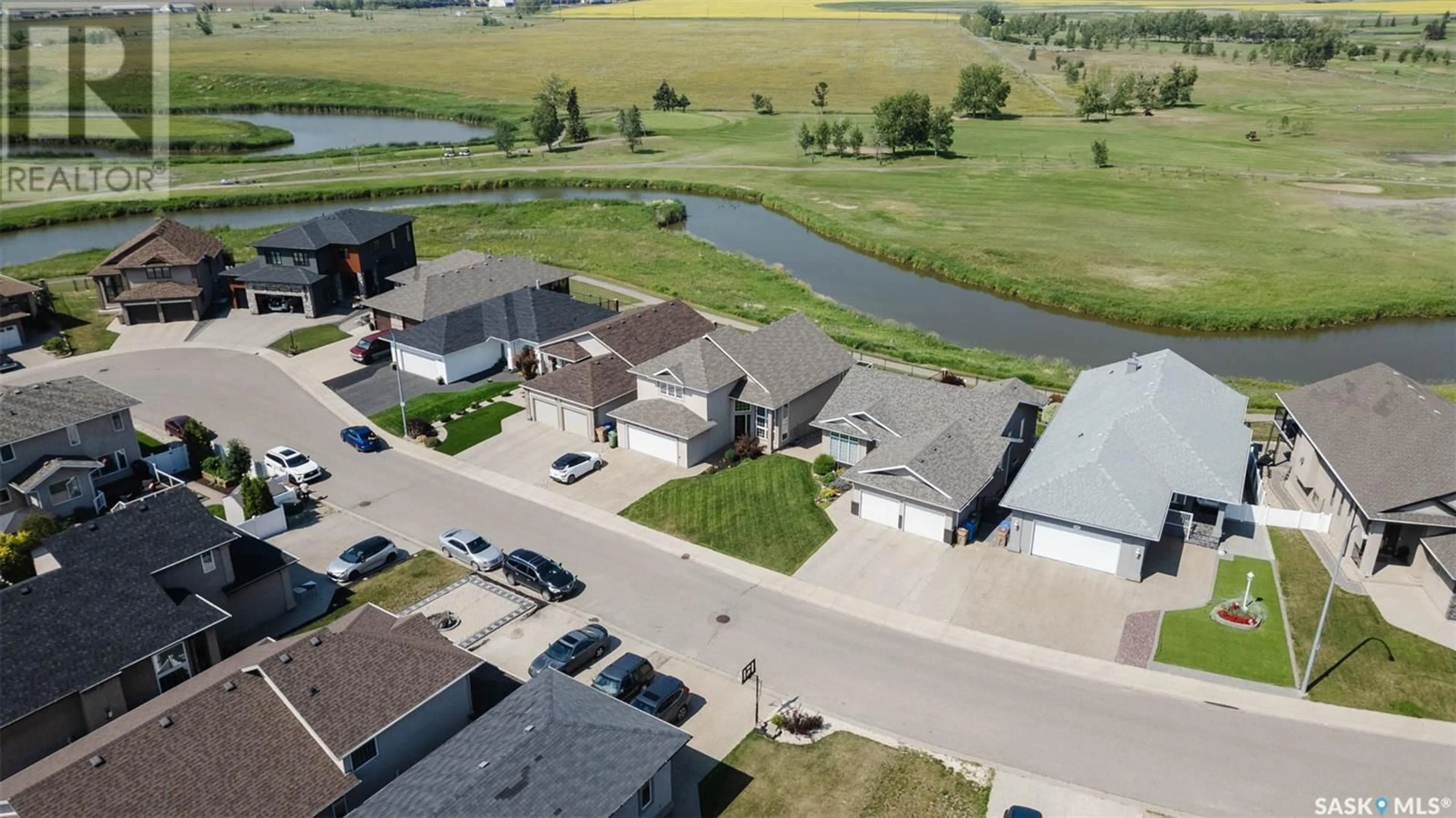 A pic from outside/outdoor area/front of a property/back of a property/a pic from drone, water/lake/river/ocean view for 8083 FAIRWAYS WEST DRIVE, Regina Saskatchewan S4Y0A4