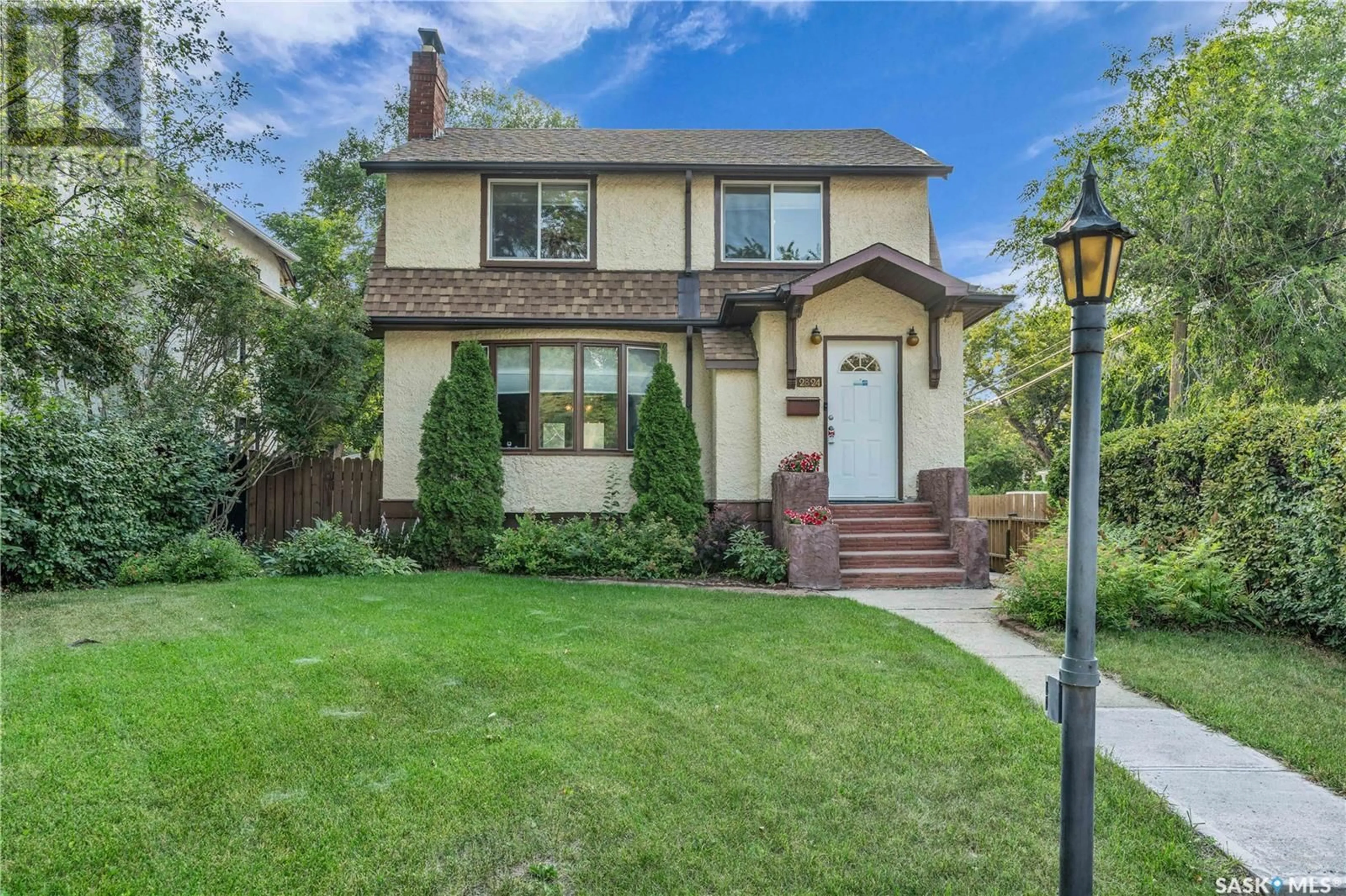 Home with brick exterior material, street for 2824 ROBINSON STREET, Regina Saskatchewan S4S1T8