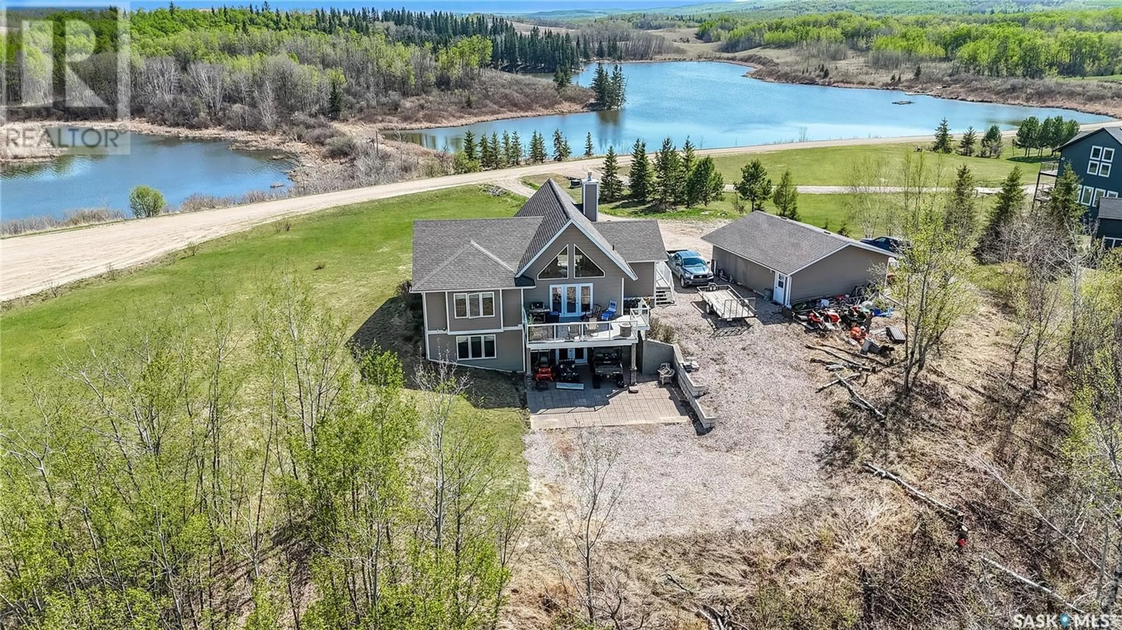A pic from outside/outdoor area/front of a property/back of a property/a pic from drone, water/lake/river/ocean view for 35 LAKE DRIVE, Leask Rm No. 464 Saskatchewan S0J1M0