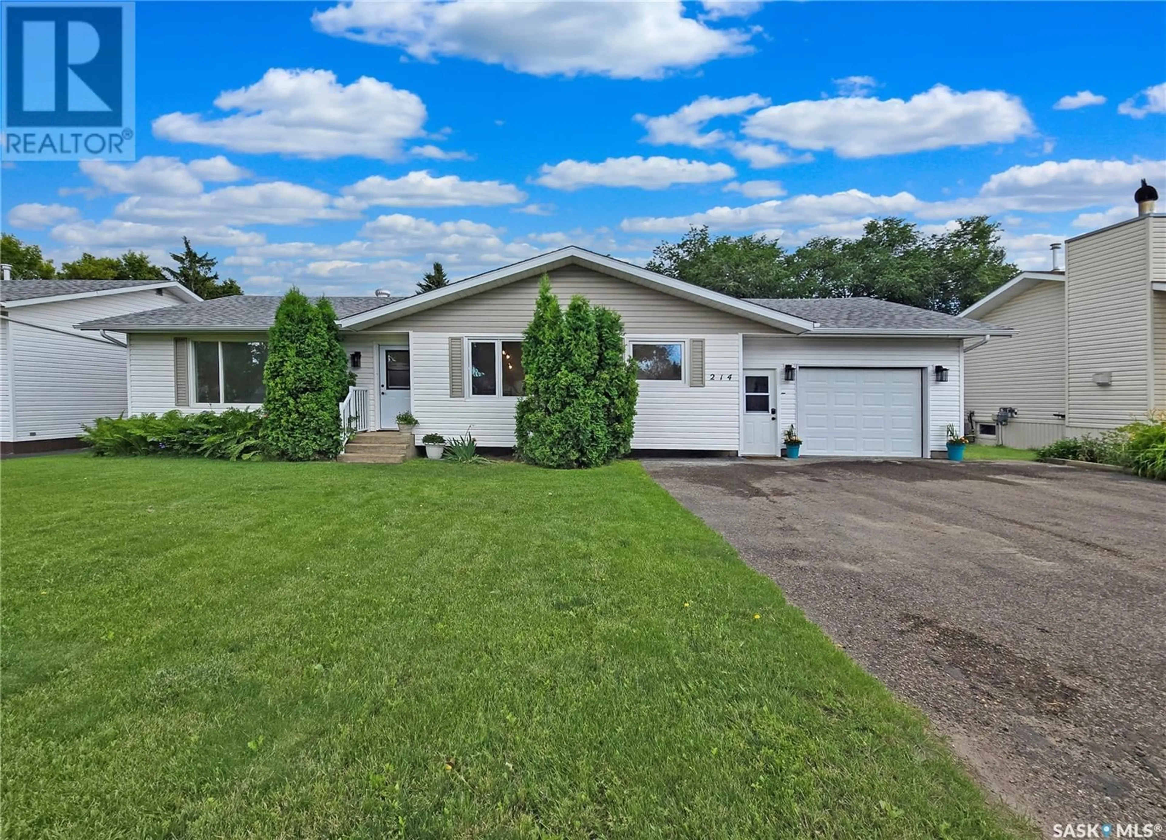 Home with vinyl exterior material, street for 214 PELLETIER DRIVE, Swift Current Saskatchewan S9H4K4
