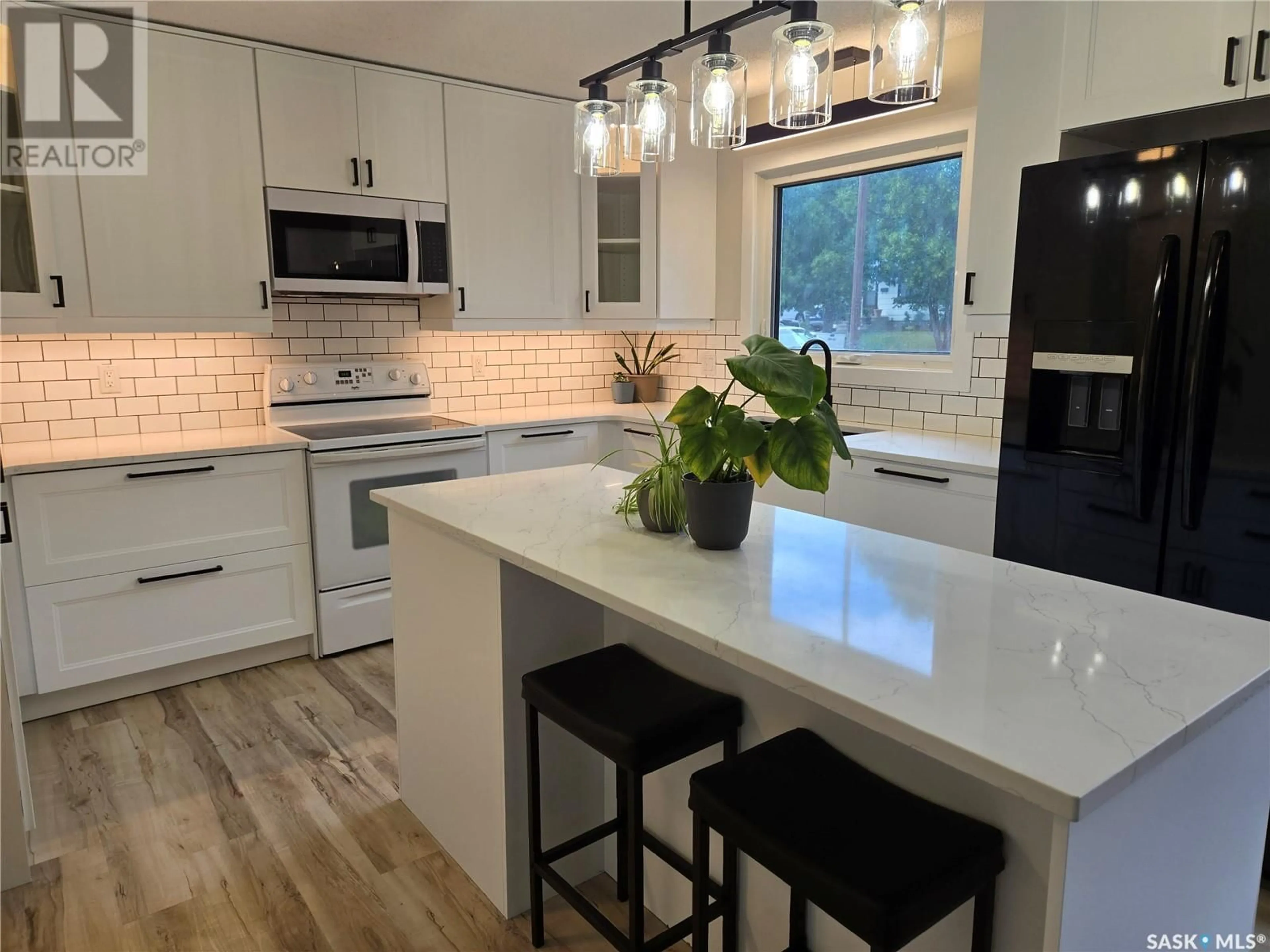 Open concept kitchen, unknown for 214 PELLETIER DRIVE, Swift Current Saskatchewan S9H4K4