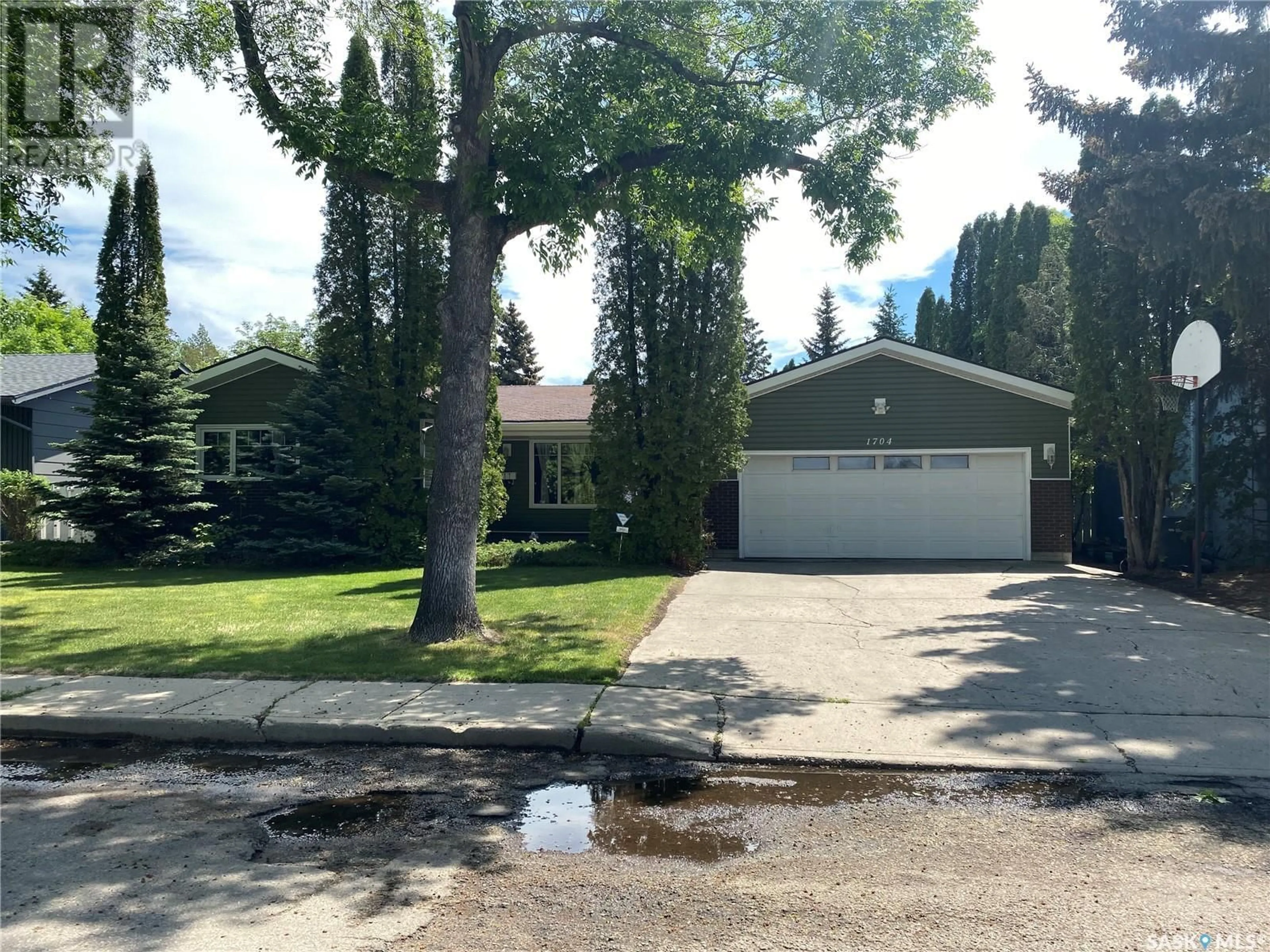 A pic from outside/outdoor area/front of a property/back of a property/a pic from drone, street for 1704 GREGORY DRIVE, North Battleford Saskatchewan S9A3E2