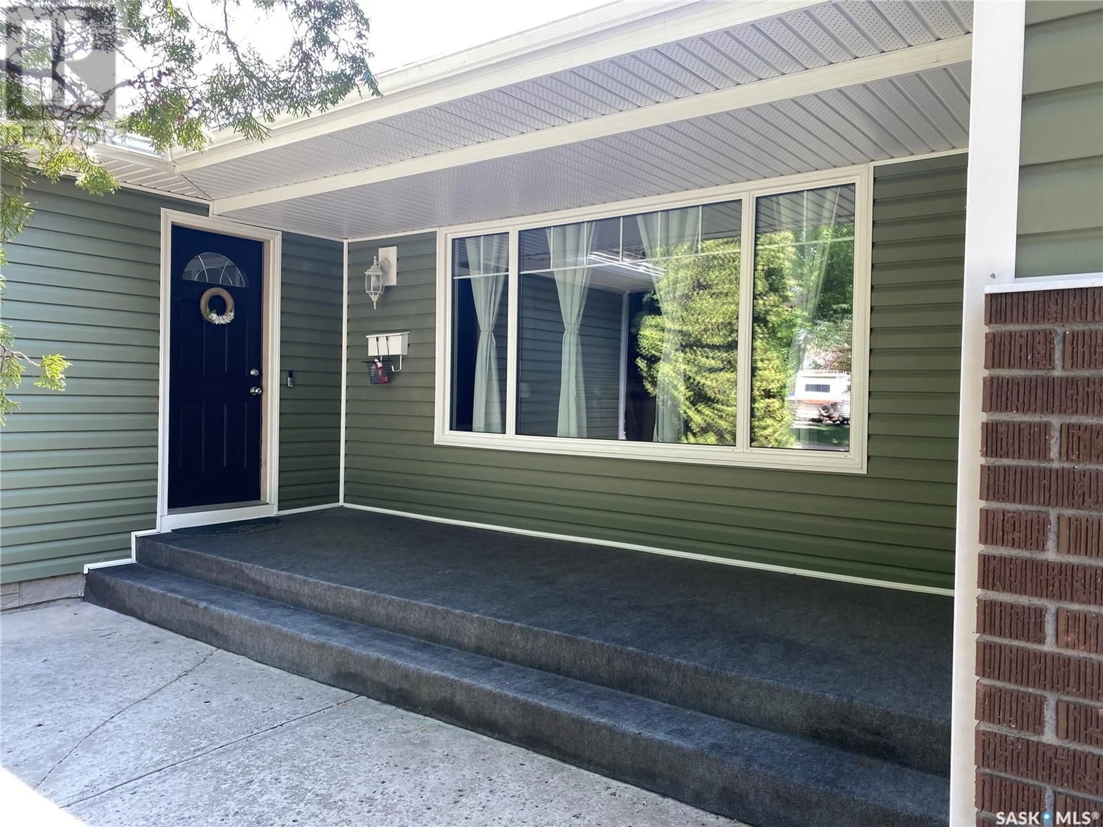 Home with vinyl exterior material, street for 1704 GREGORY DRIVE, North Battleford Saskatchewan S9A3E2