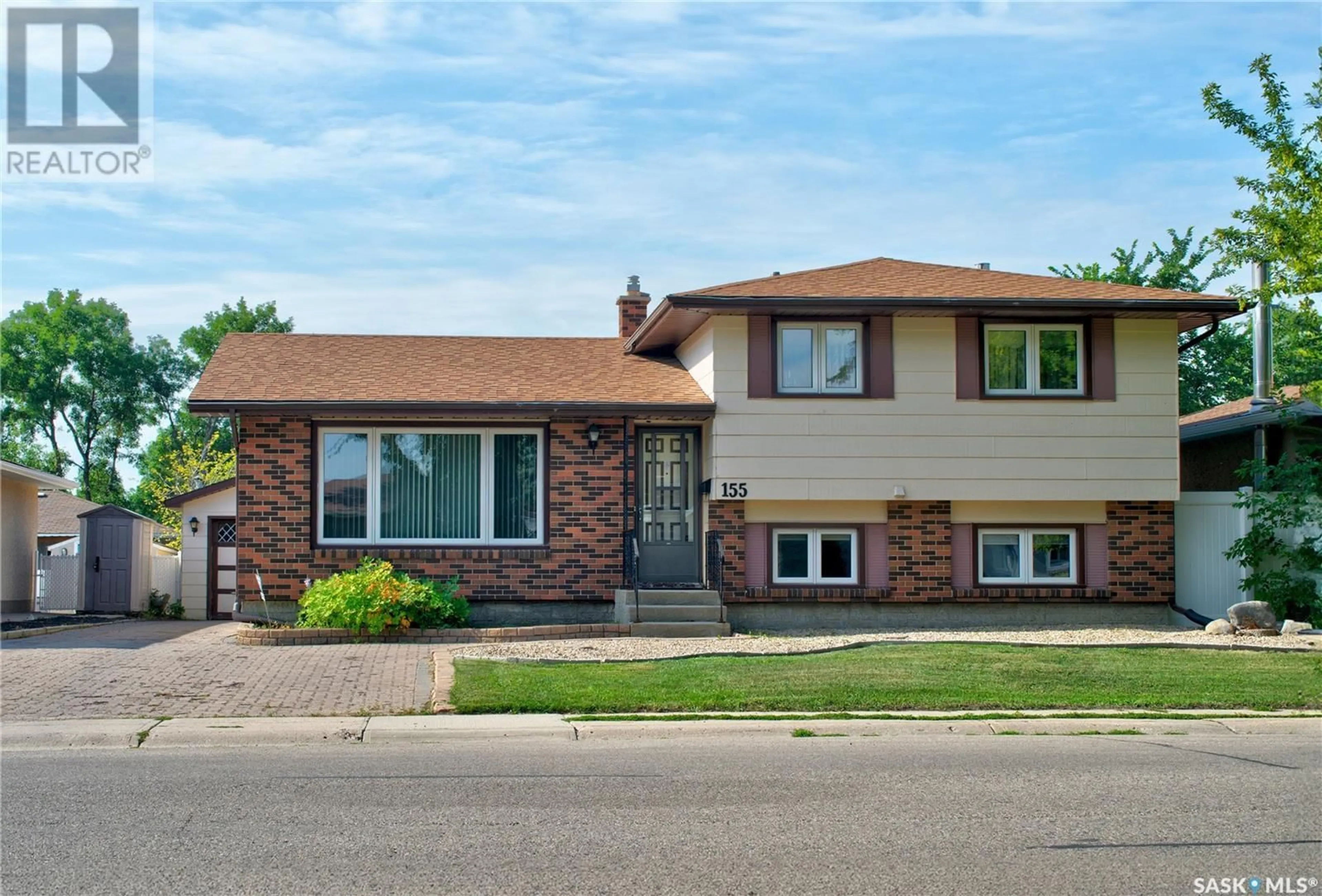 Home with brick exterior material, street for 155 RODENBUSH DRIVE, Regina Saskatchewan S4R7X8