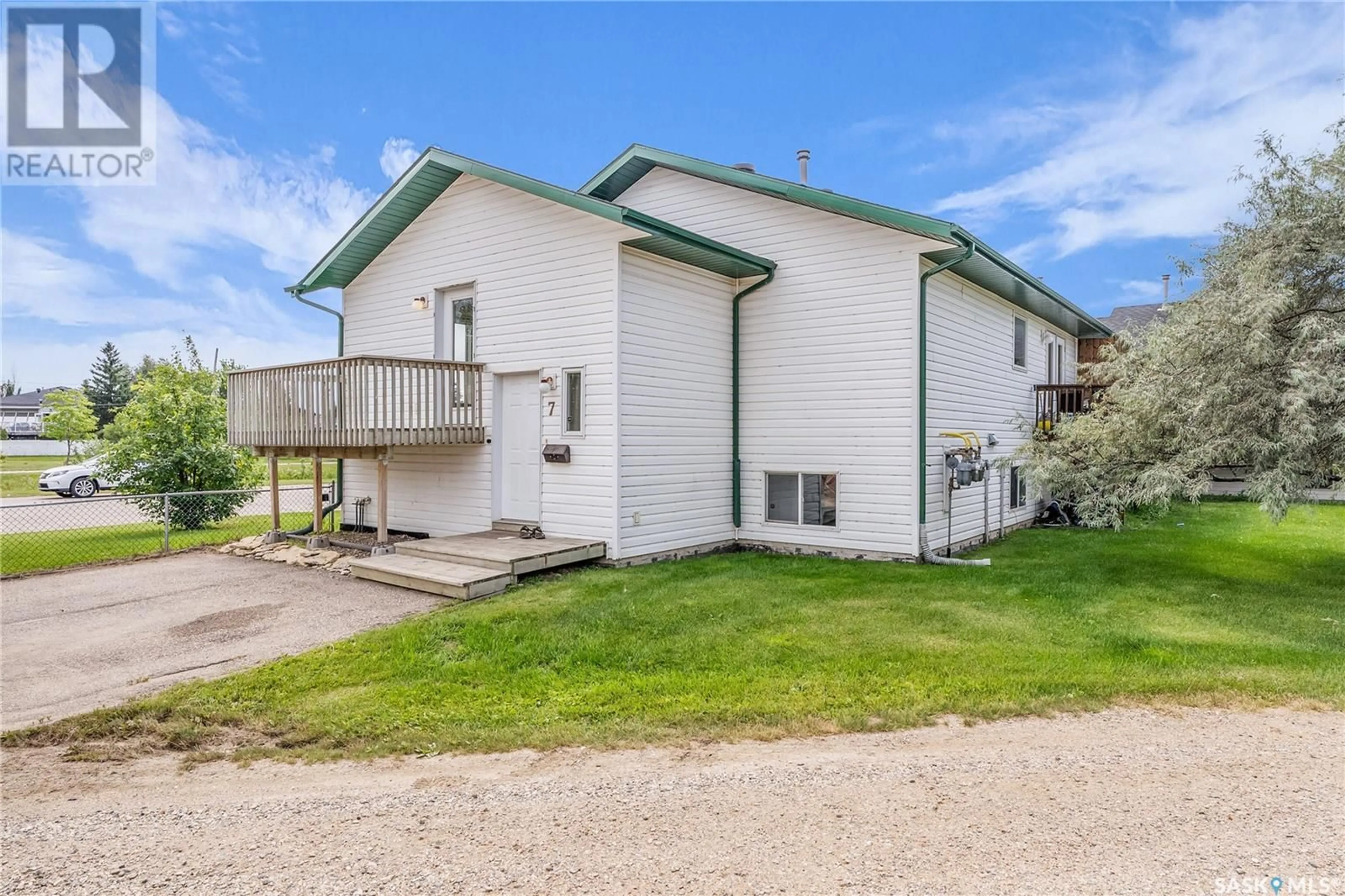 A pic from outside/outdoor area/front of a property/back of a property/a pic from drone, building for 7 - 512 REDDEKOPP DRIVE, Martensville Saskatchewan S0K2T0