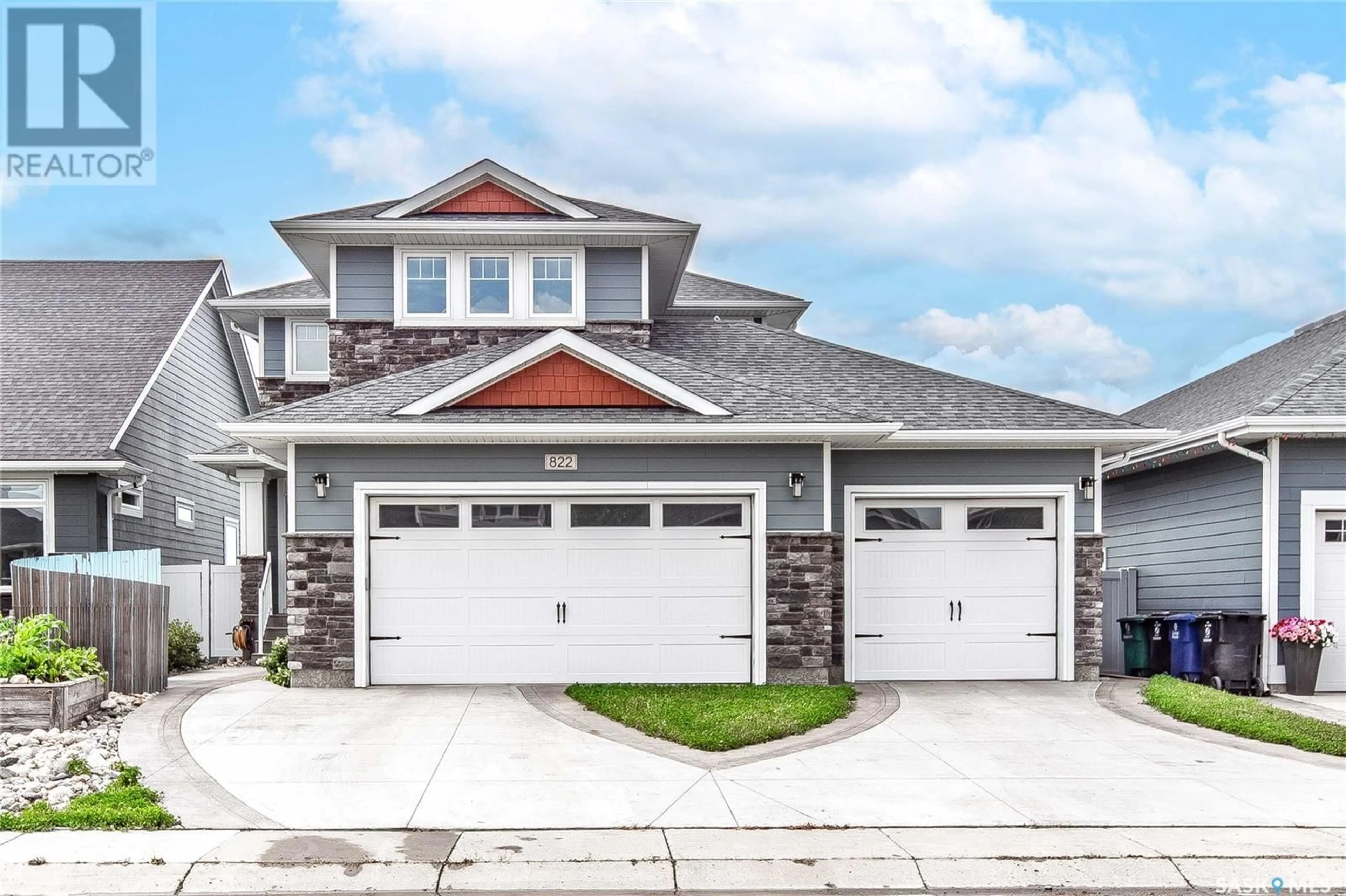 Home with vinyl exterior material, street for 822 PRINGLE COVE, Saskatoon Saskatchewan S7T0V3