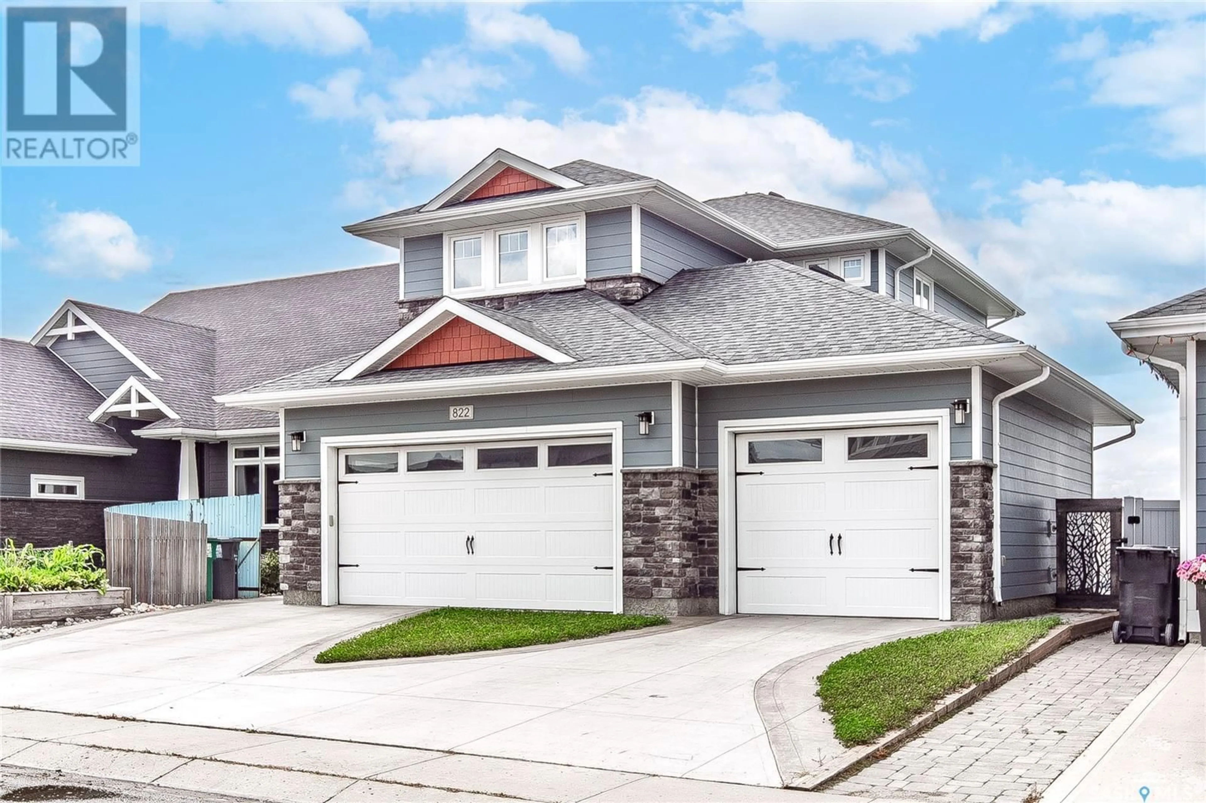 Home with vinyl exterior material, street for 822 PRINGLE COVE, Saskatoon Saskatchewan S7T0V3