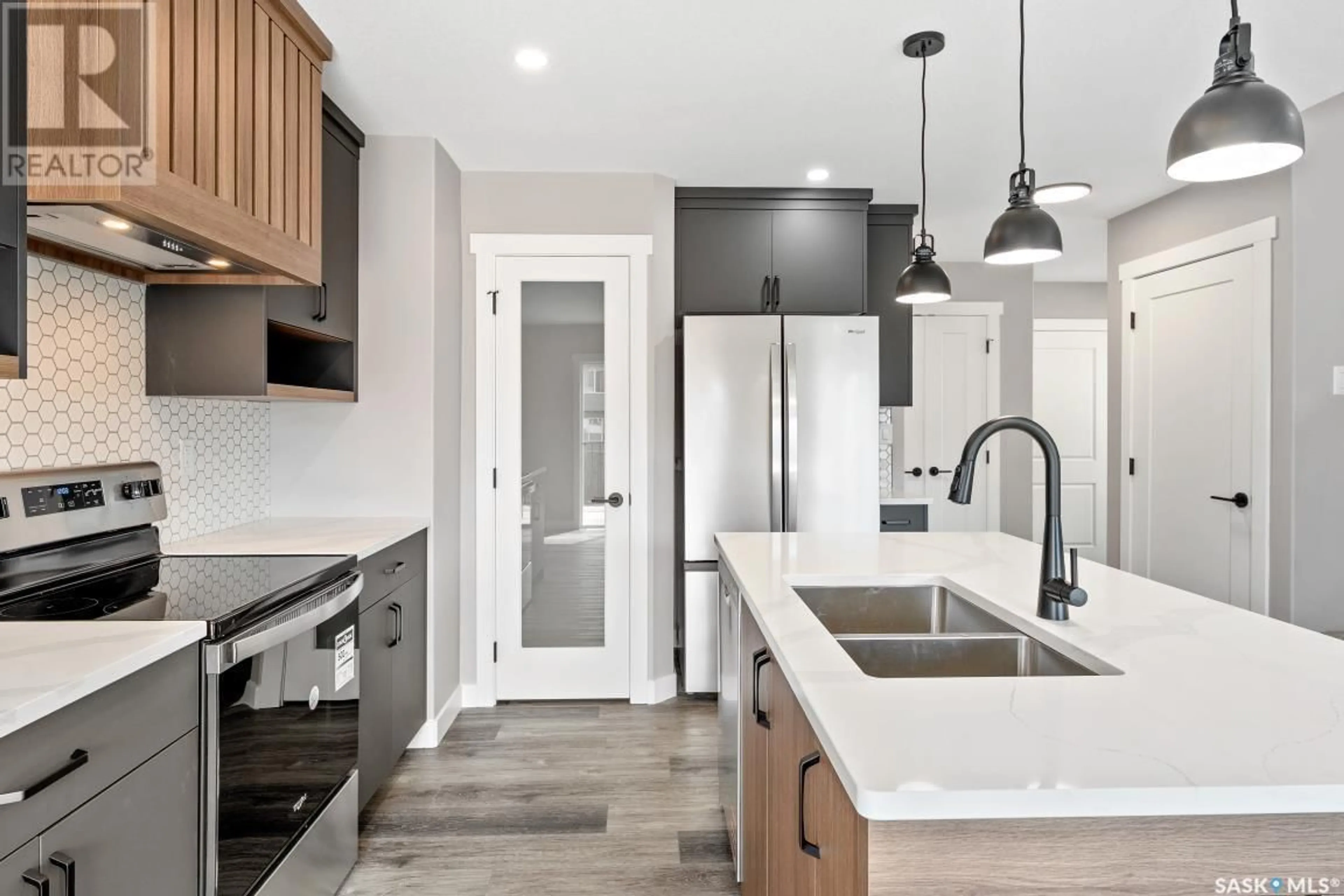 Open concept kitchen, ceramic/tile floor for 328 MYLES HEIDT LANE, Saskatoon Saskatchewan S7W1J3