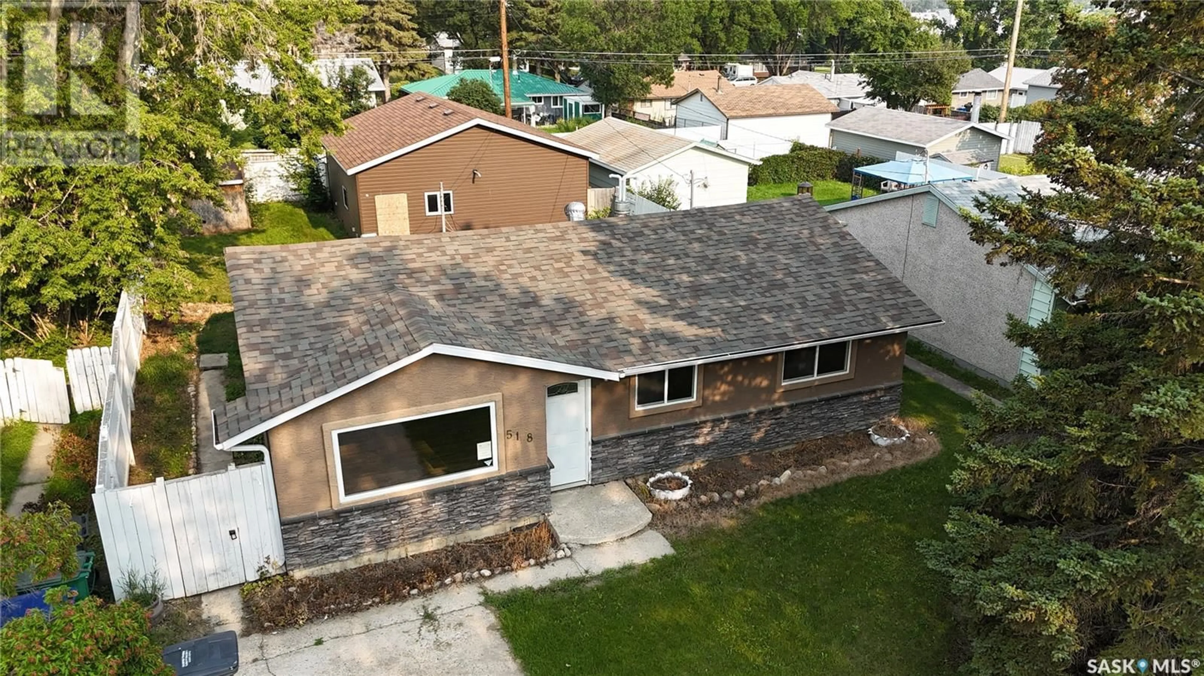 A pic from outside/outdoor area/front of a property/back of a property/a pic from drone, street for 518 U AVENUE, Saskatoon Saskatchewan S7M3C7