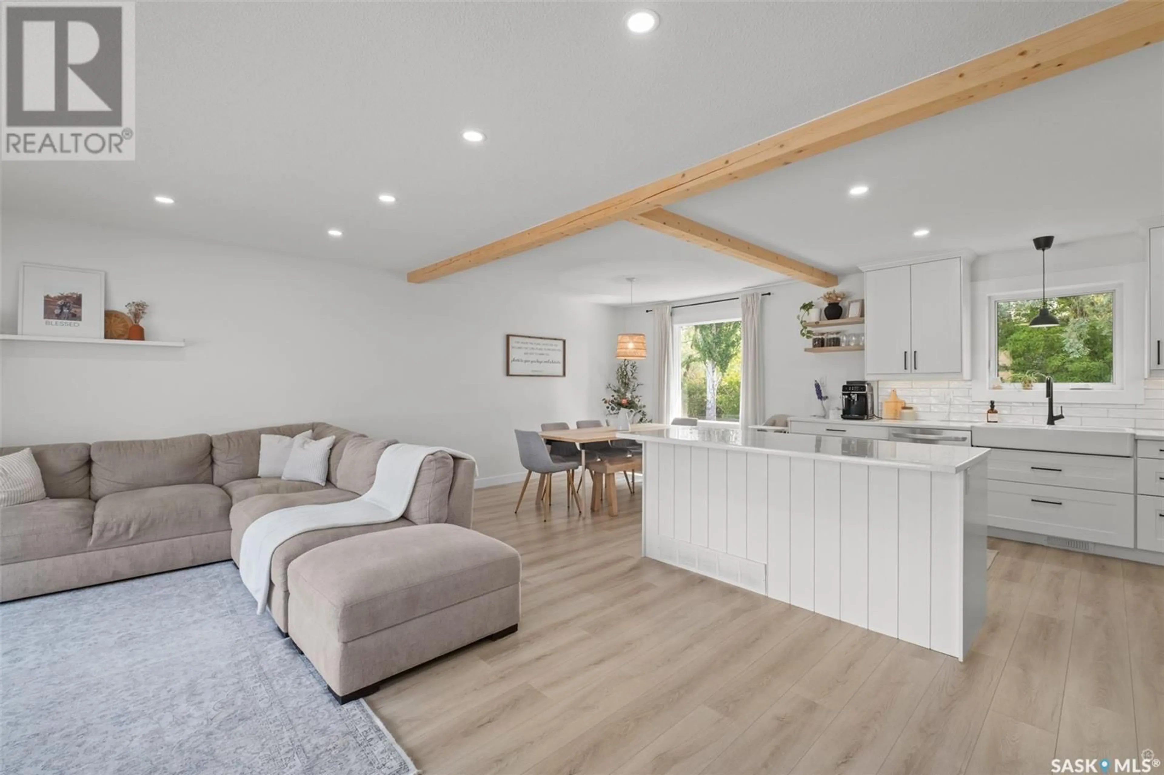 Open concept kitchen, wood/laminate floor for 840 CHESTER PLACE, Prince Albert Saskatchewan S6V6Y8