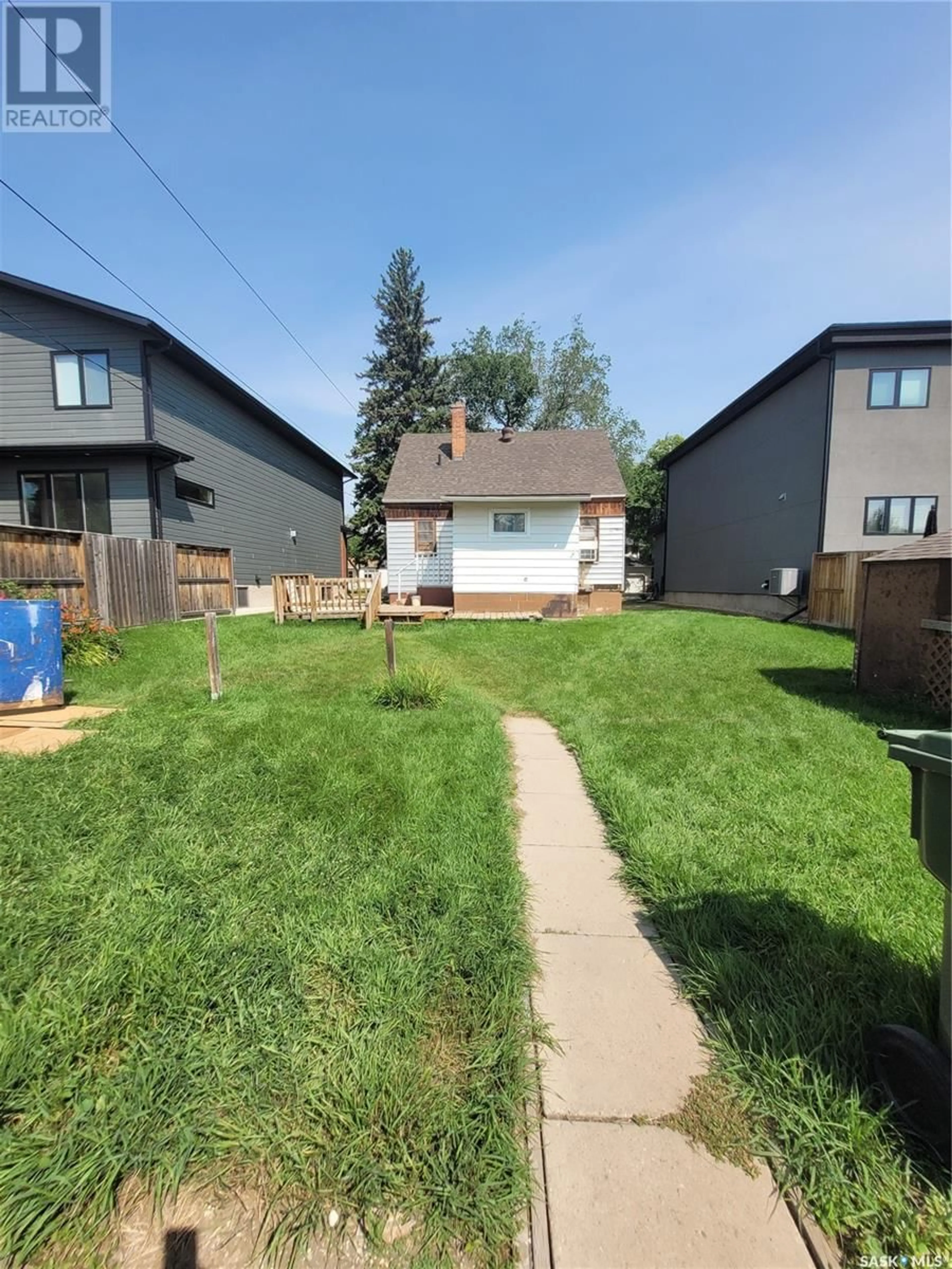 A pic from outside/outdoor area/front of a property/back of a property/a pic from drone, street for 1322 15TH STREET, Saskatoon Saskatchewan S7N0R9